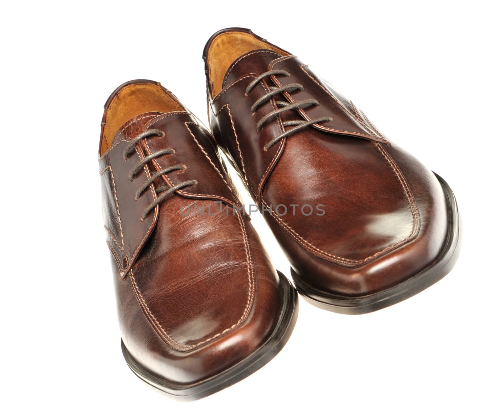 Pair a shoe a brown leather. Man's shoes isolated on a white background