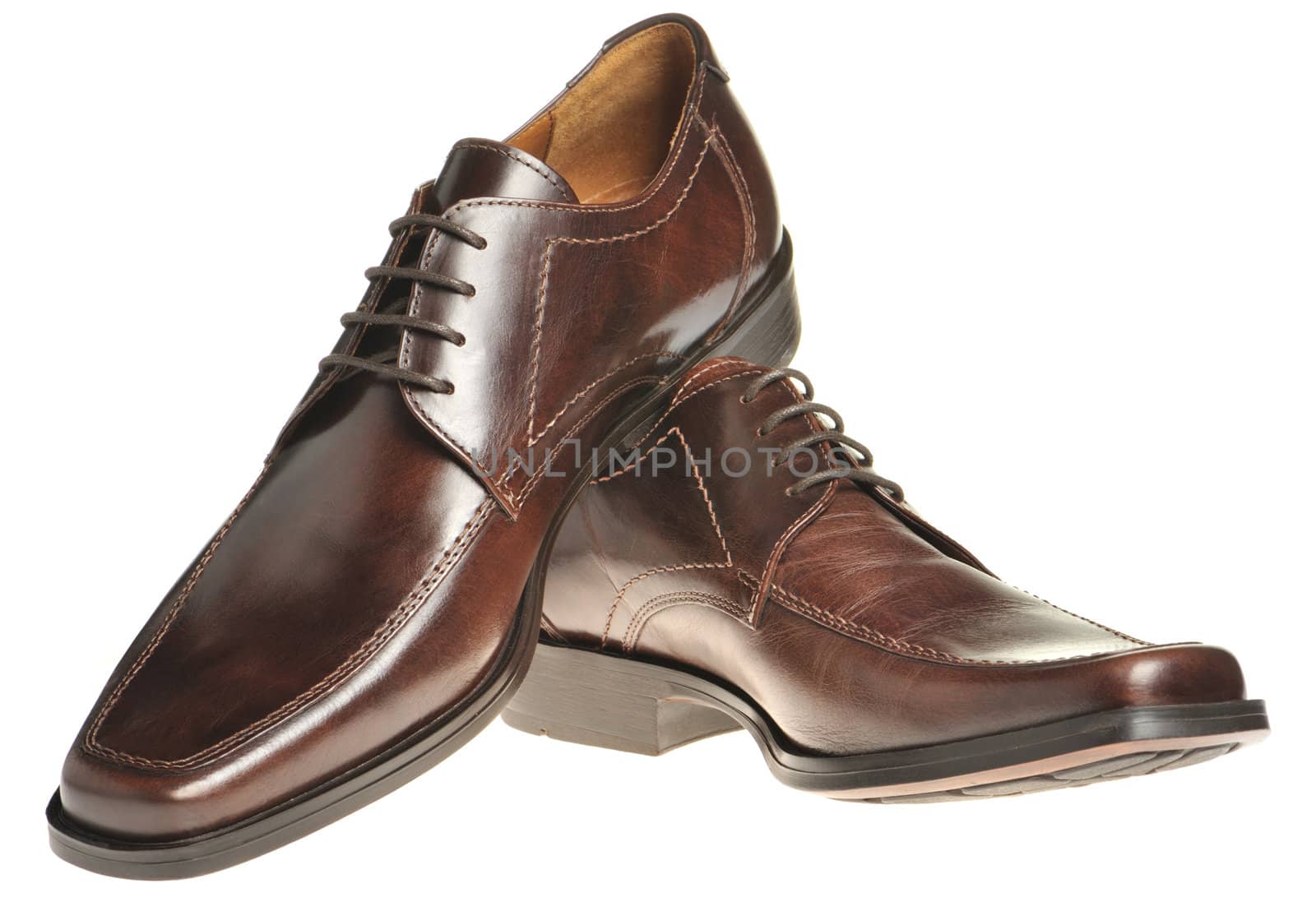 Pair a shoe a brown leather. Man's shoes isolated on a white background