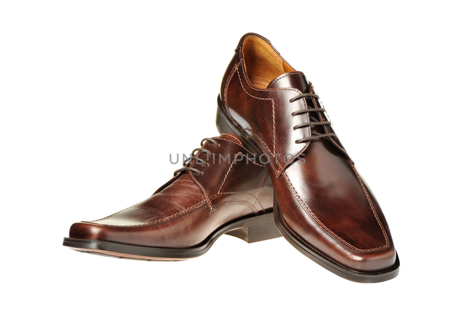Pair a shoe a brown leather. Man's shoes isolated on a white background