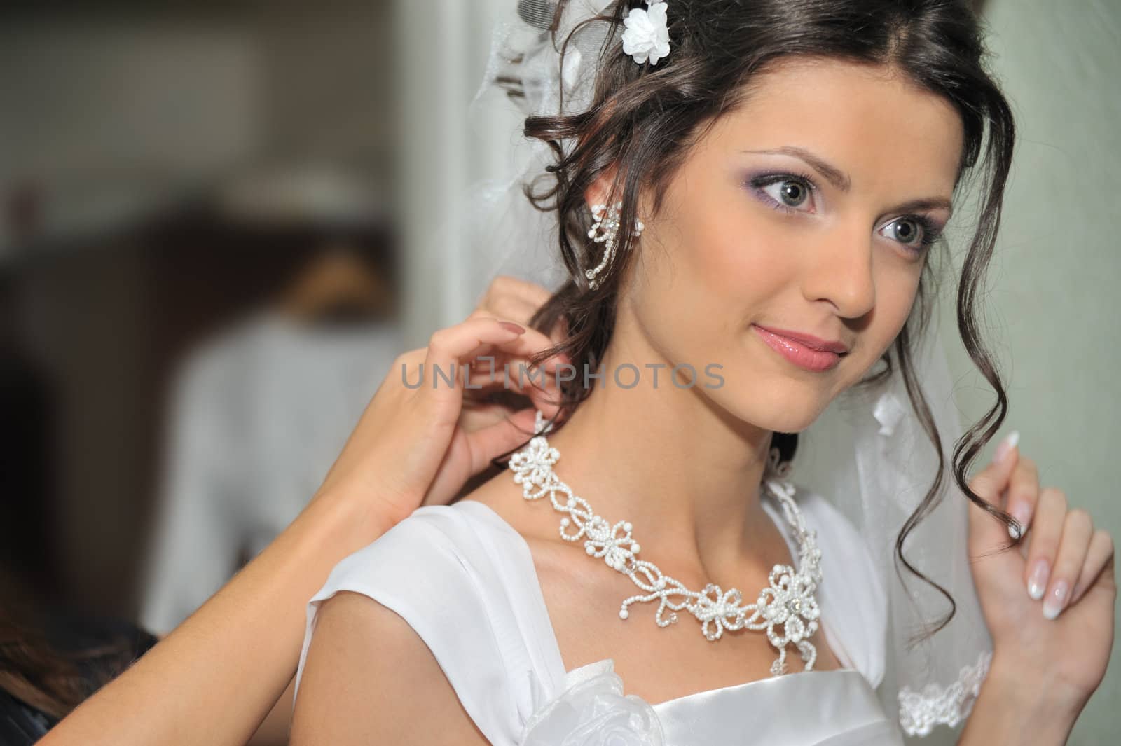 The beautiful bride. The young girl in a wedding dress.