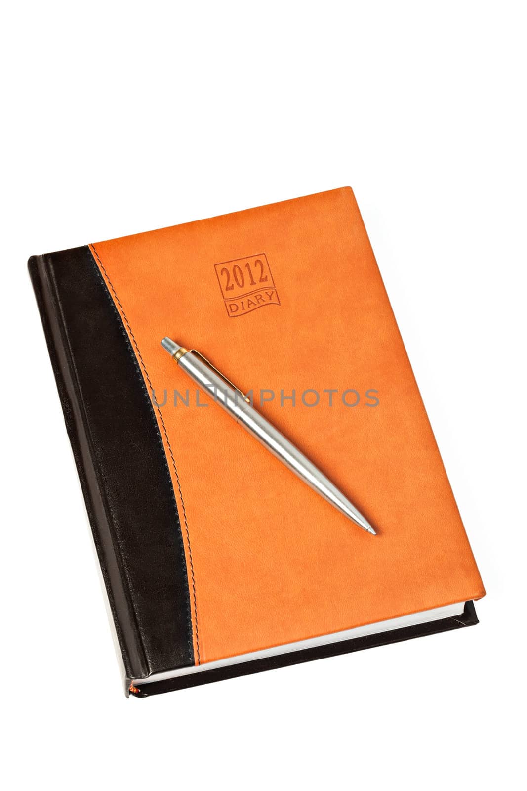 Diary and pen on table isolated by dimol