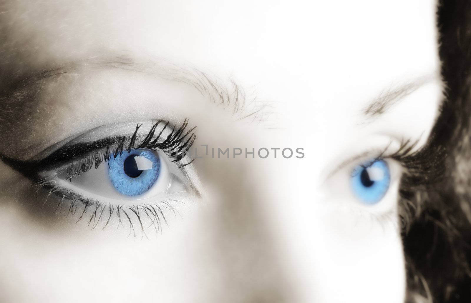 Female blue eyes. A photo close up, a part face