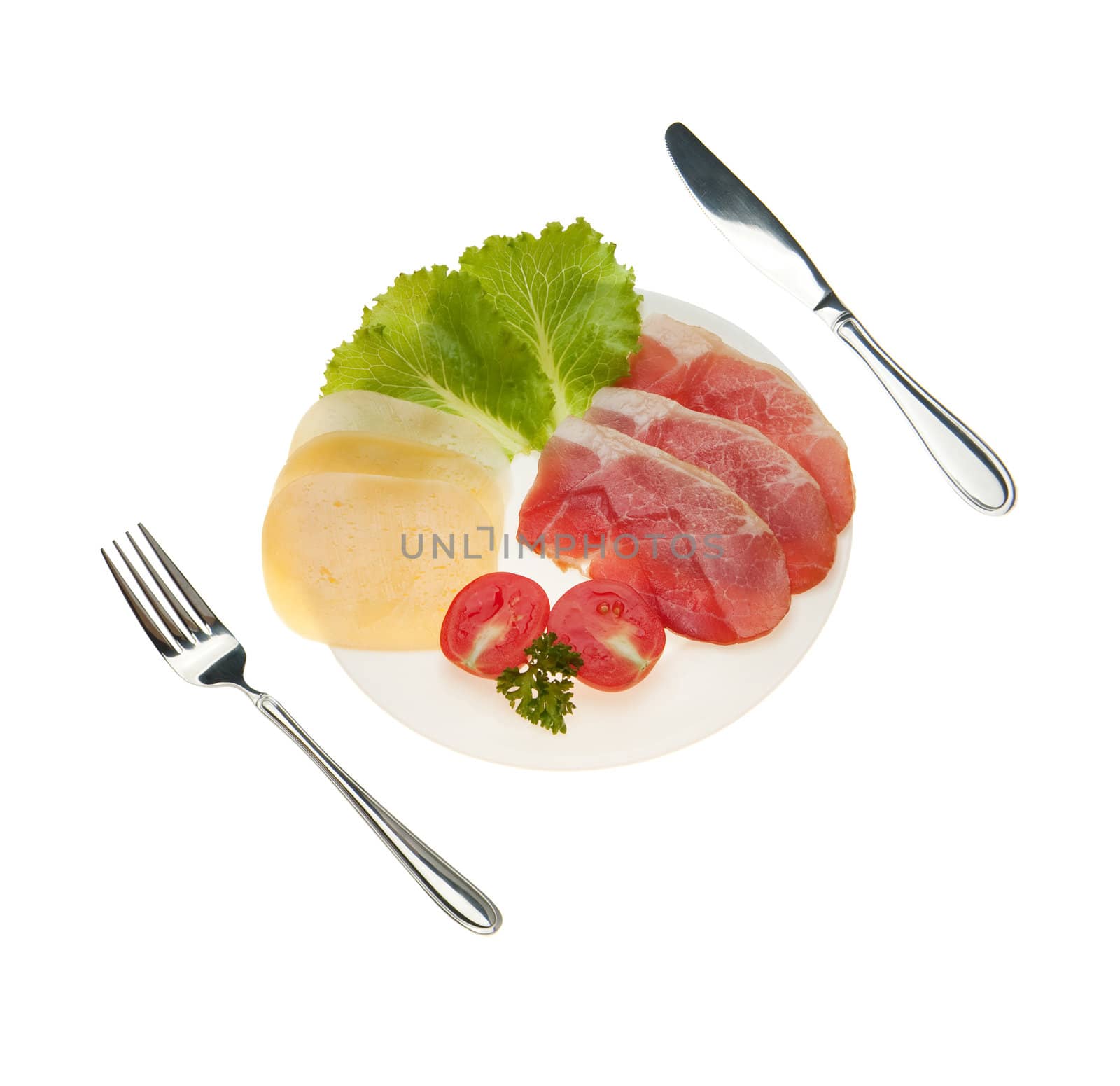 Meat cutting with vegetables and cheese. It is isolated on a white background