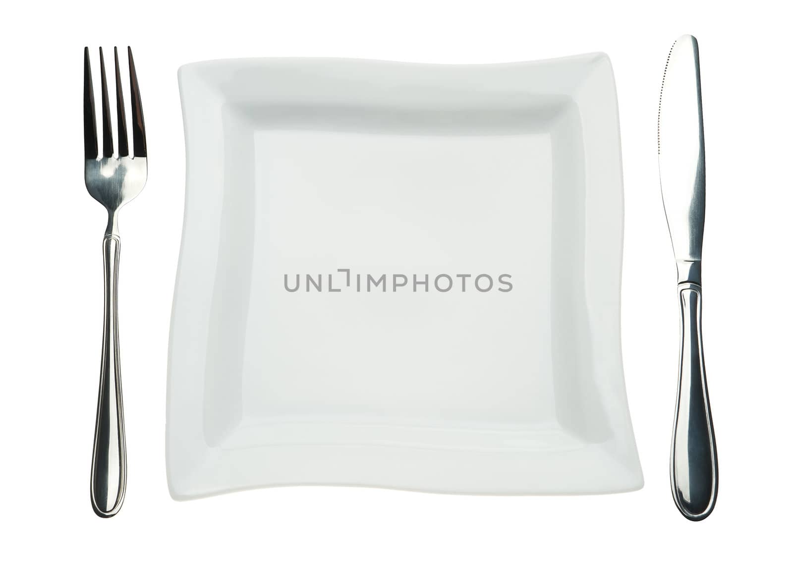 Plate, knife and fork. Kitchen utensils isolated on a white background