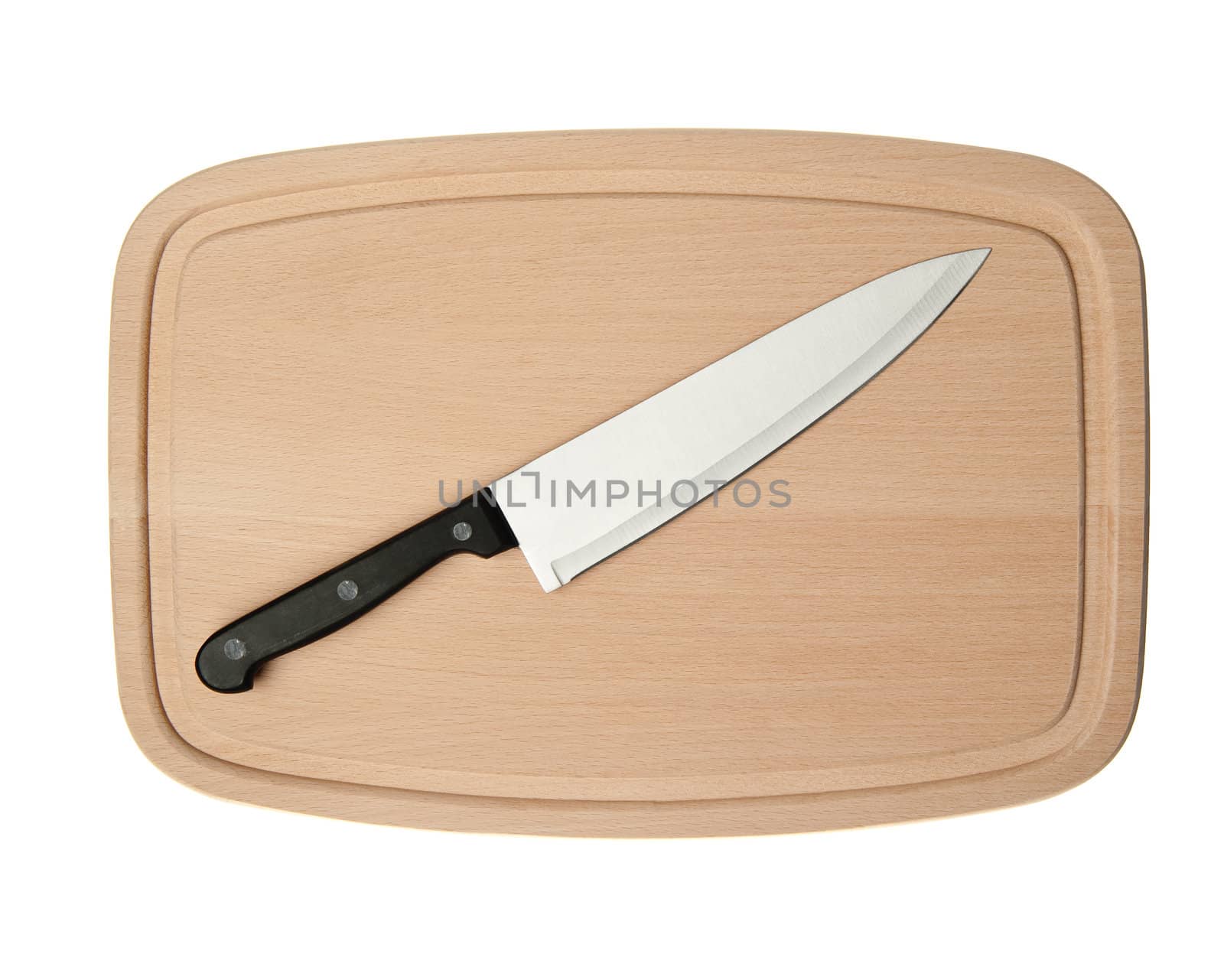 Knife and board for cutting food. Studio shooting.