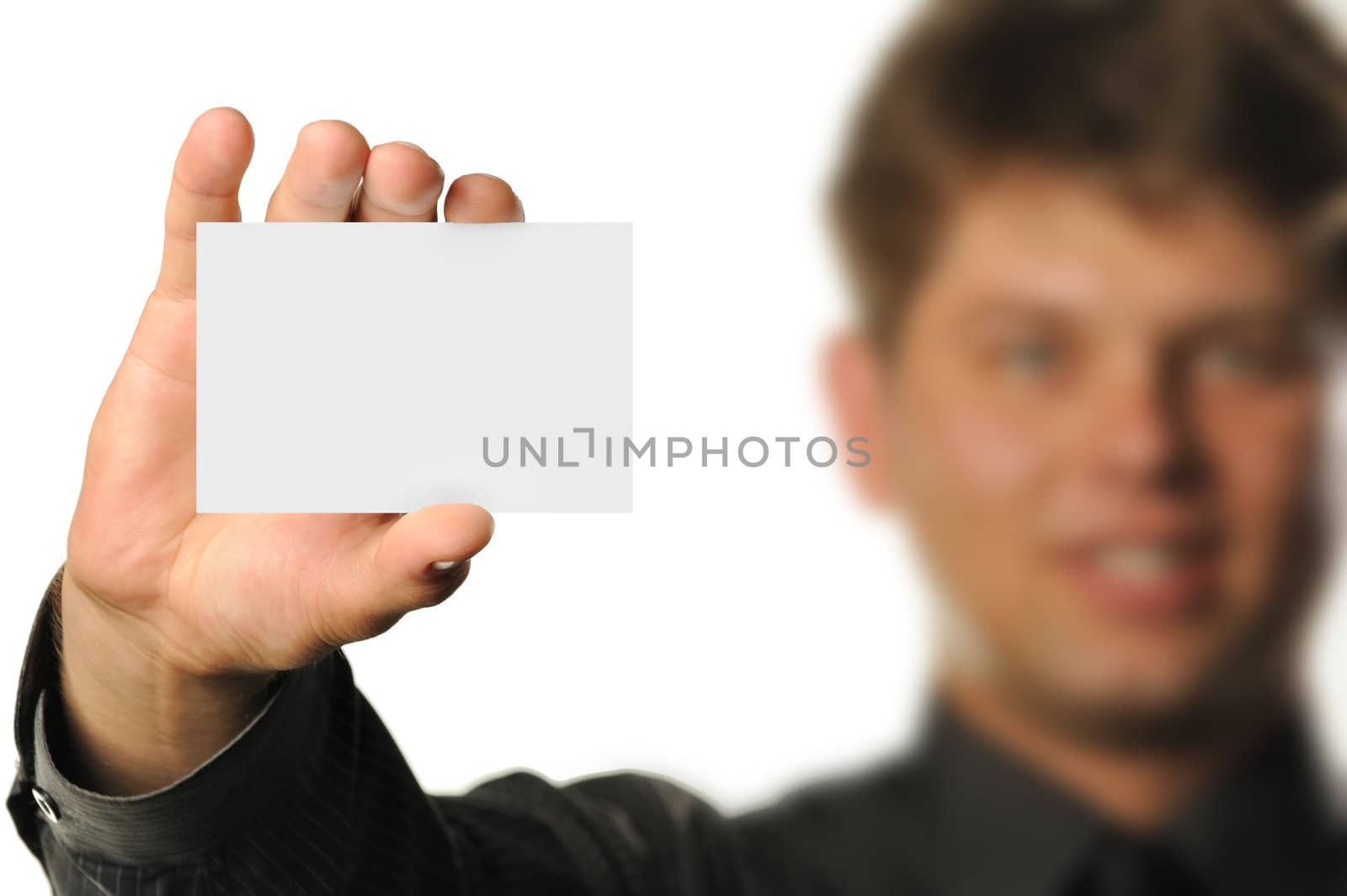 Young the man holds blank signs. It is isolated on a white background