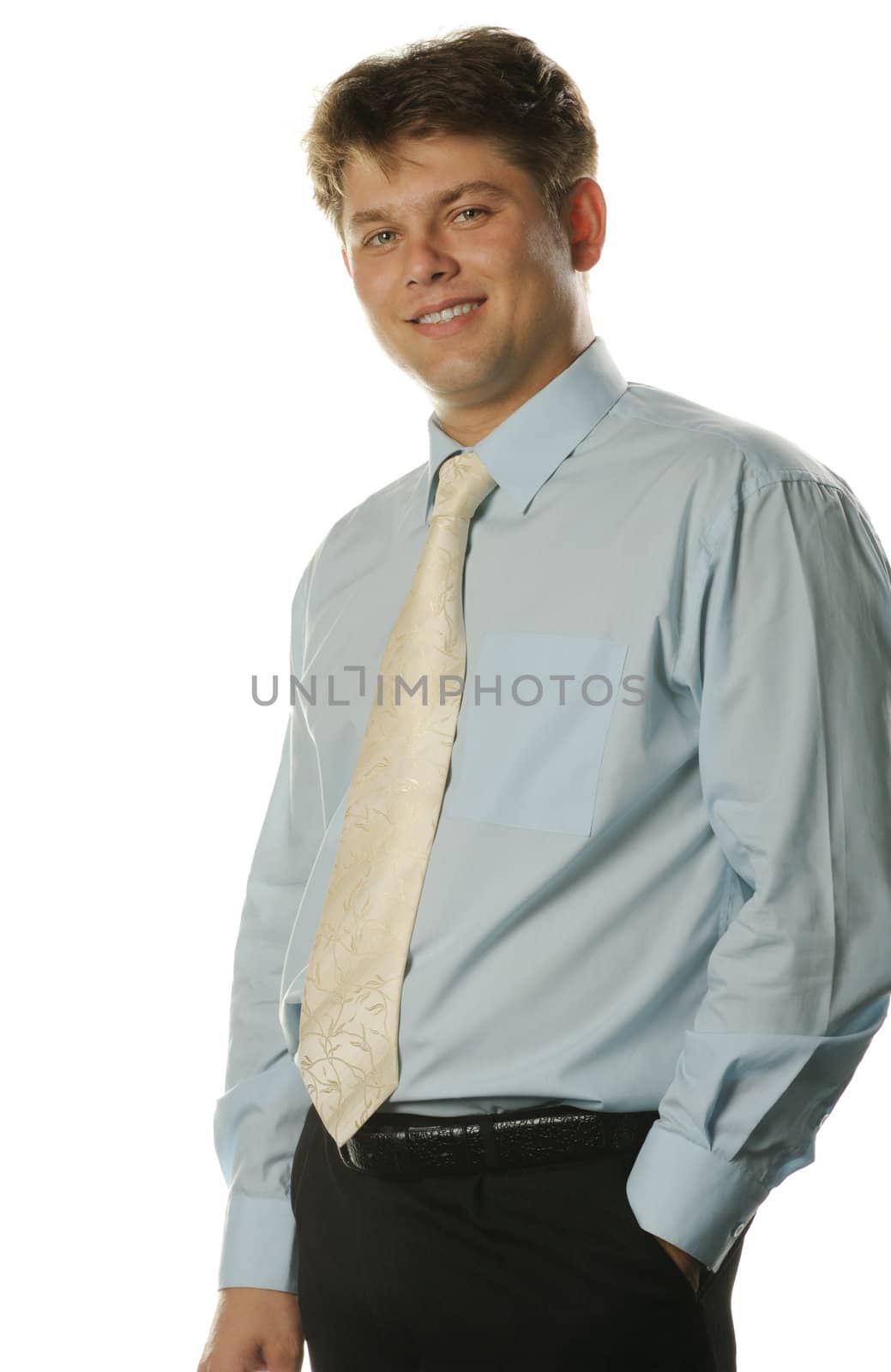 The young businessman isolated on a white background. A portrait of the man.