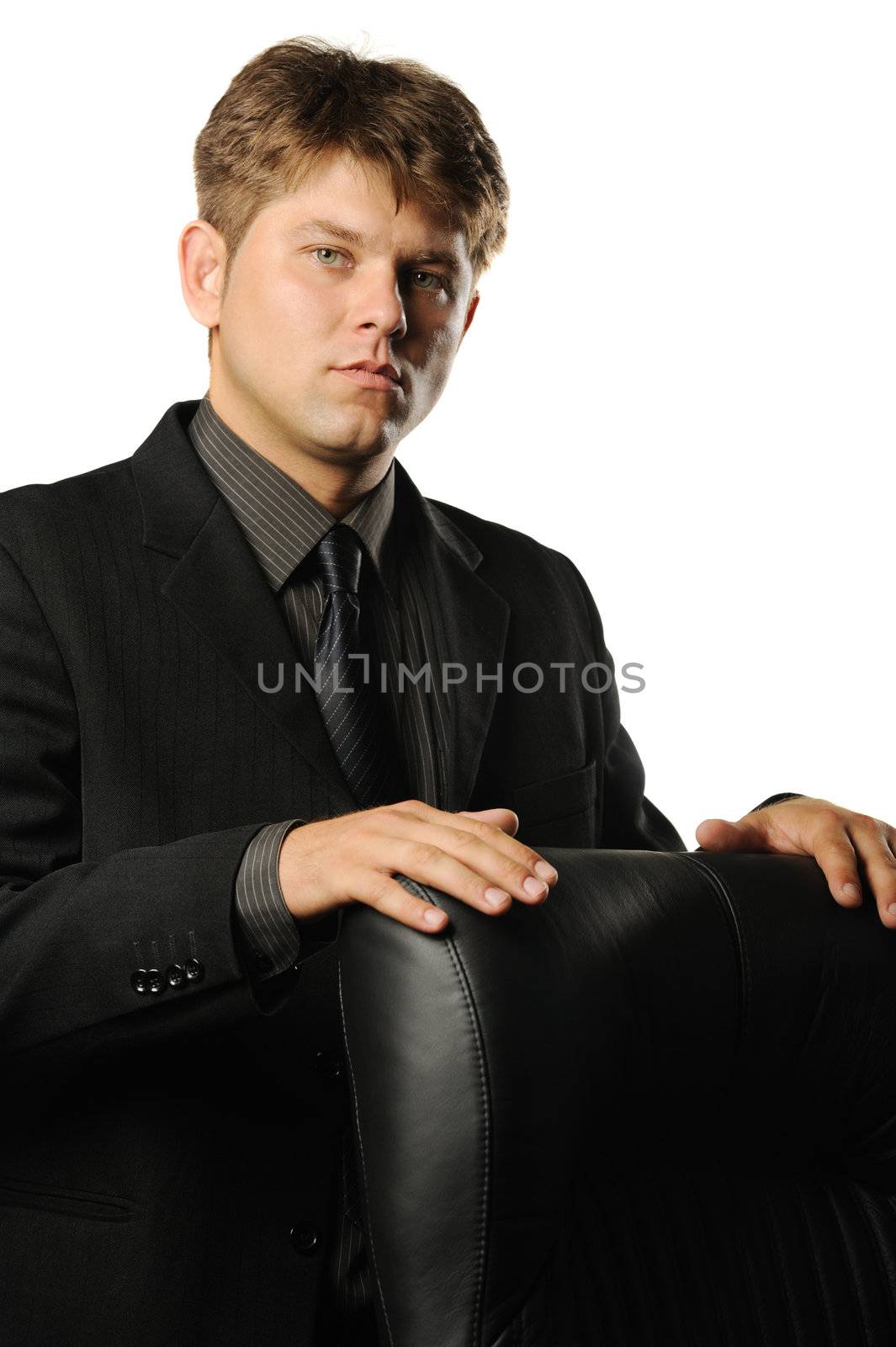 The young businessman in bad mood. A portrait of the man it is isolated on a white background.