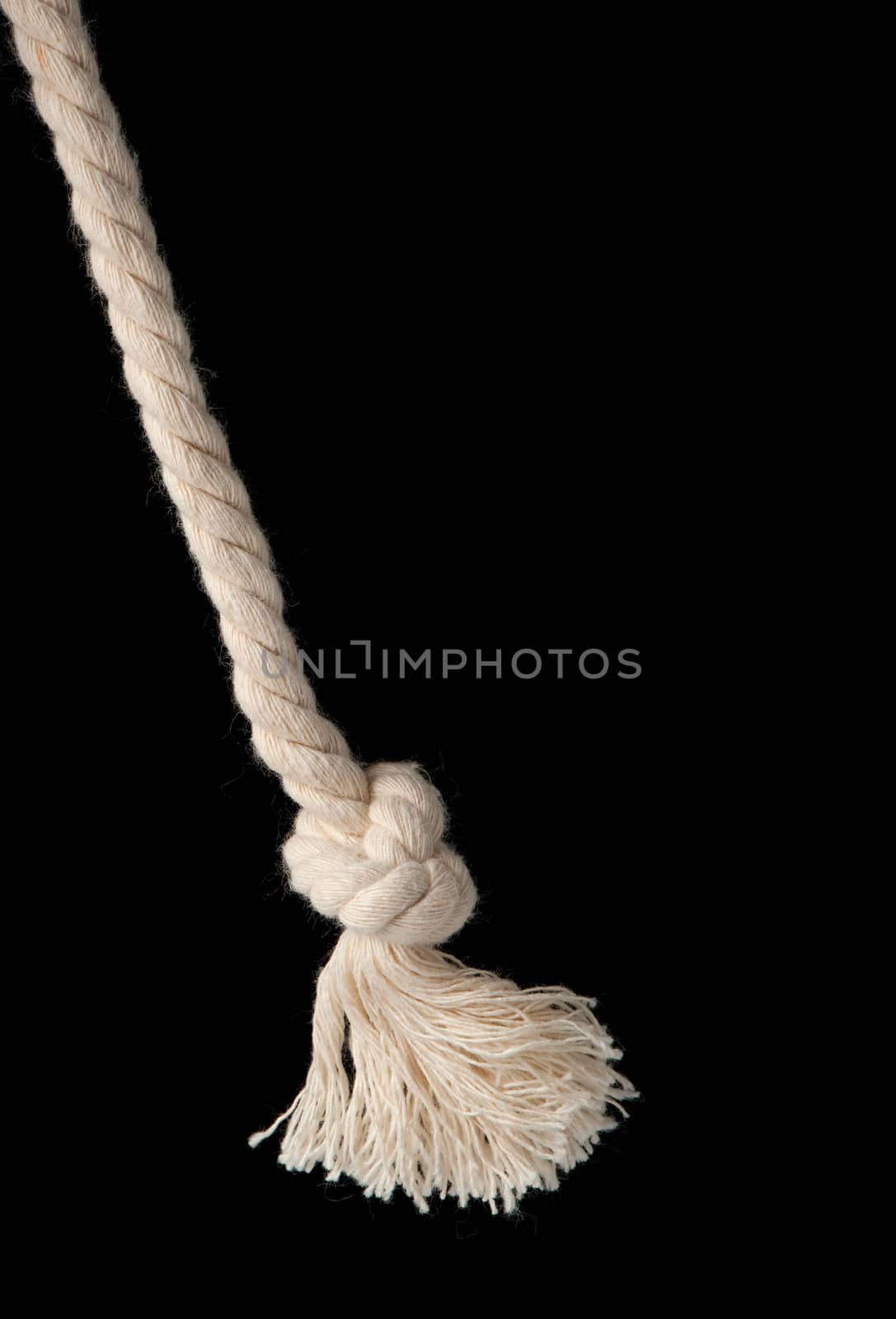 Cord with knot. A fragment of a cord it is isolated on a background