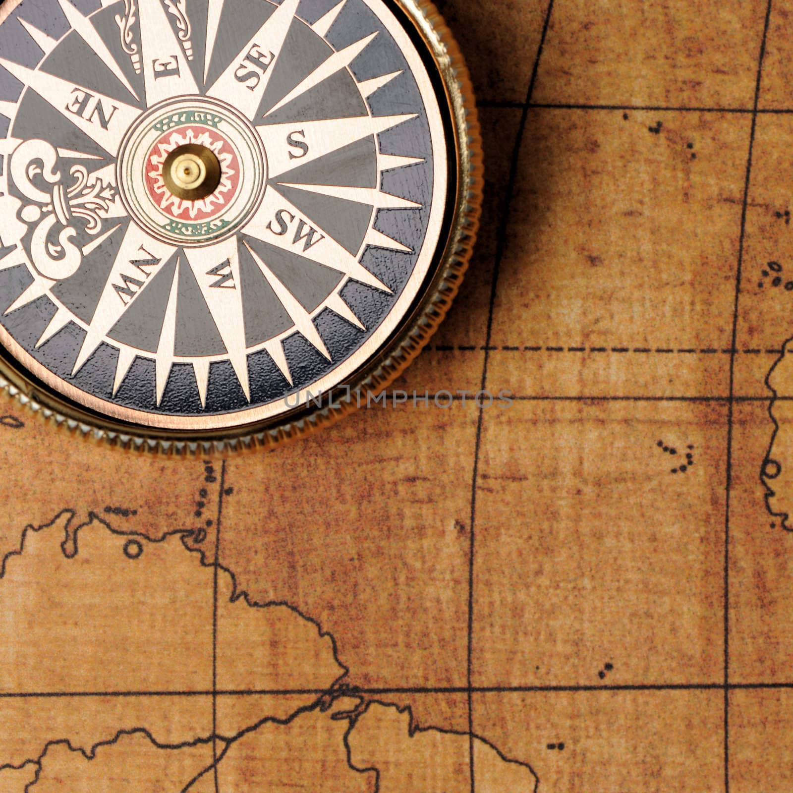 Old compass and map background. Old gold color