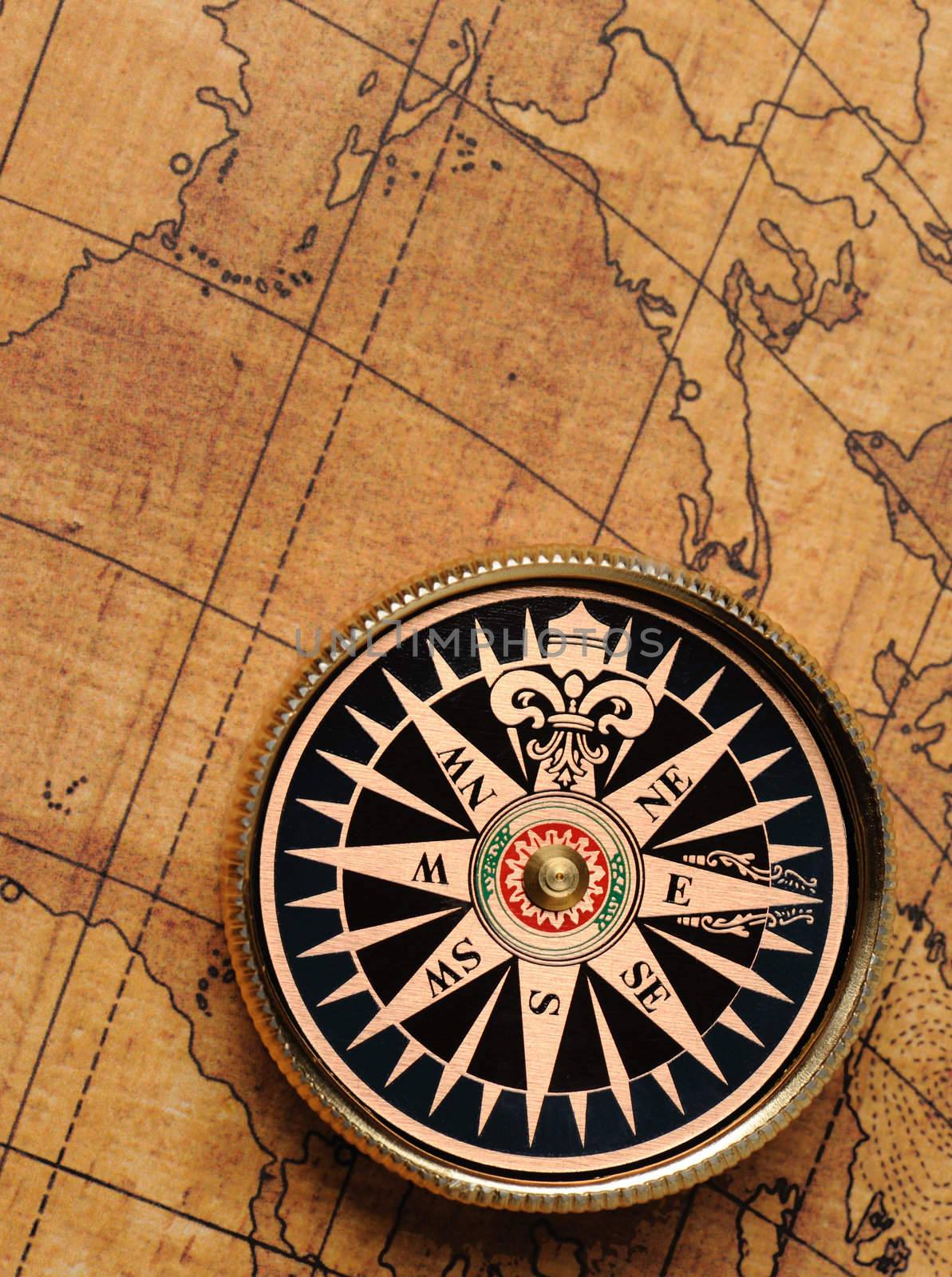 Old compass and map background. Old gold color