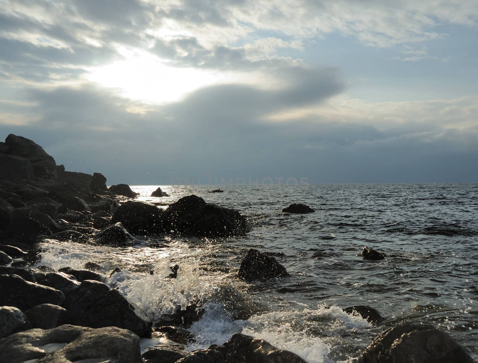 Splash of waves about coastal stones. Crimea, Ukraine