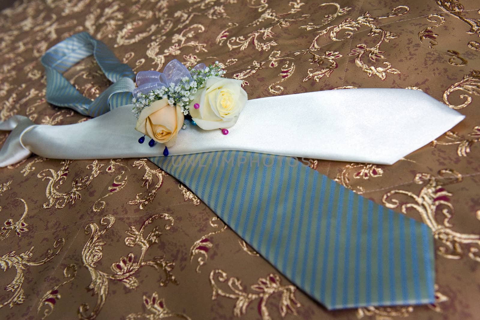 Two ties and wedding flowers