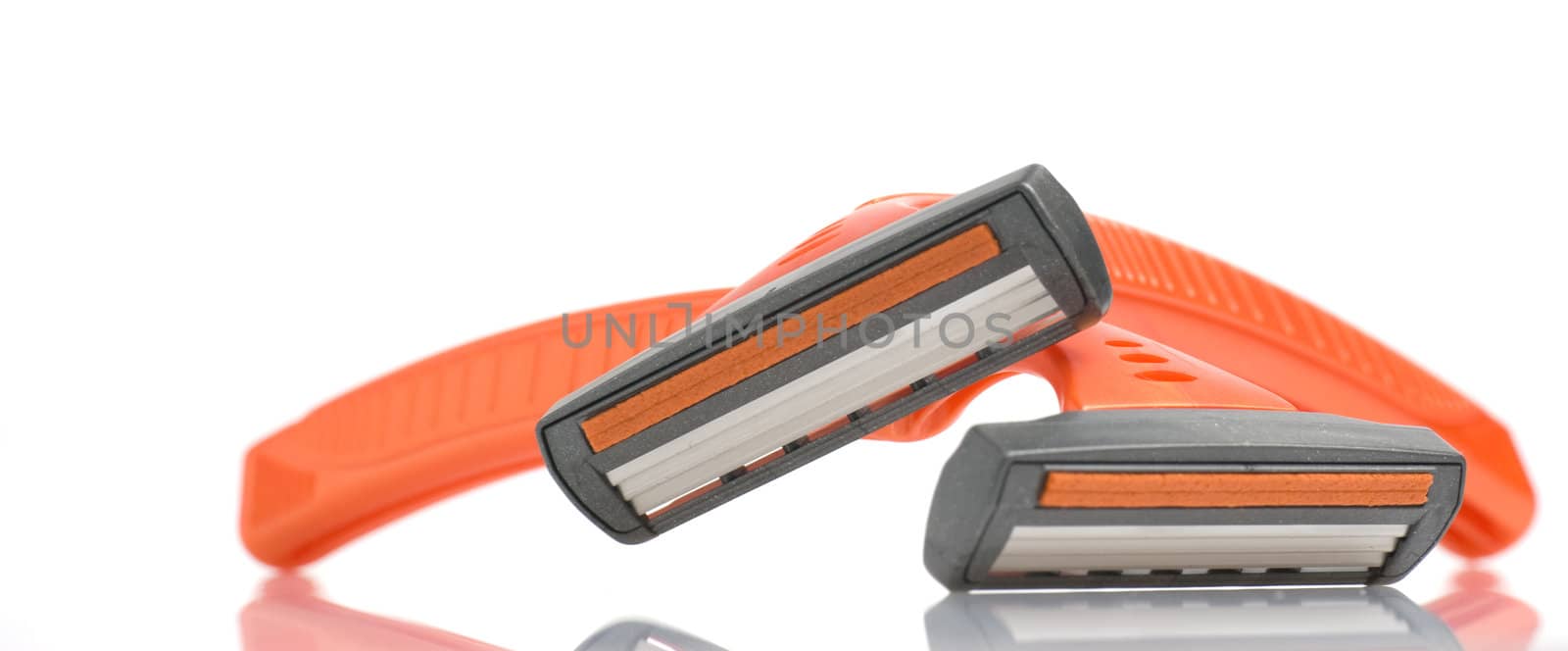 The disposable razor. The shaving machine tool isolated on a white background