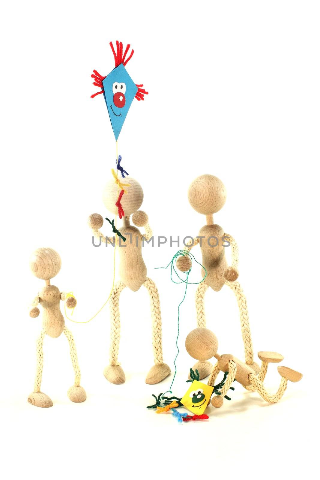 a dolls family leave the kite flying