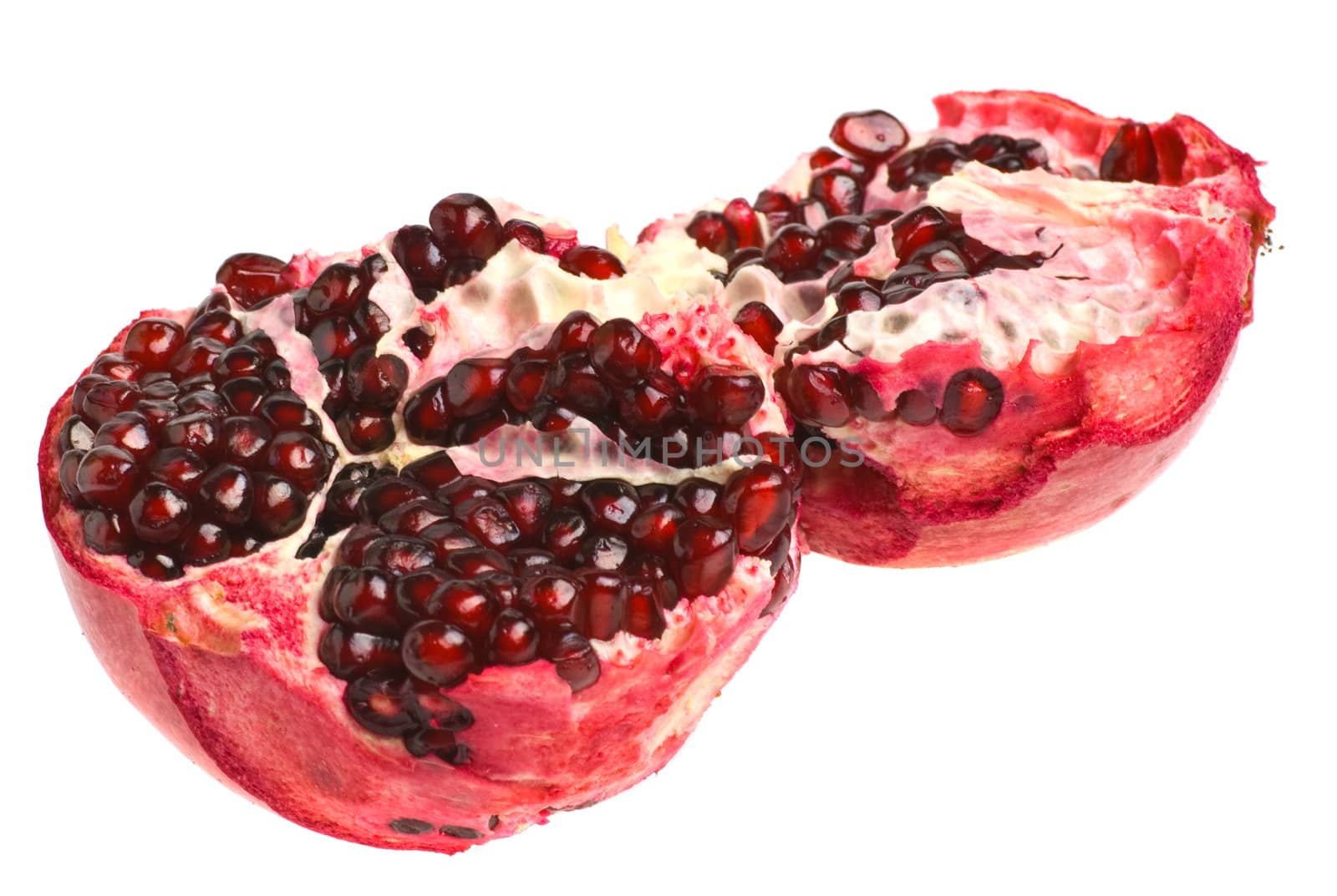 Pomegranate. Ripe fruit. It is isolated on a white background