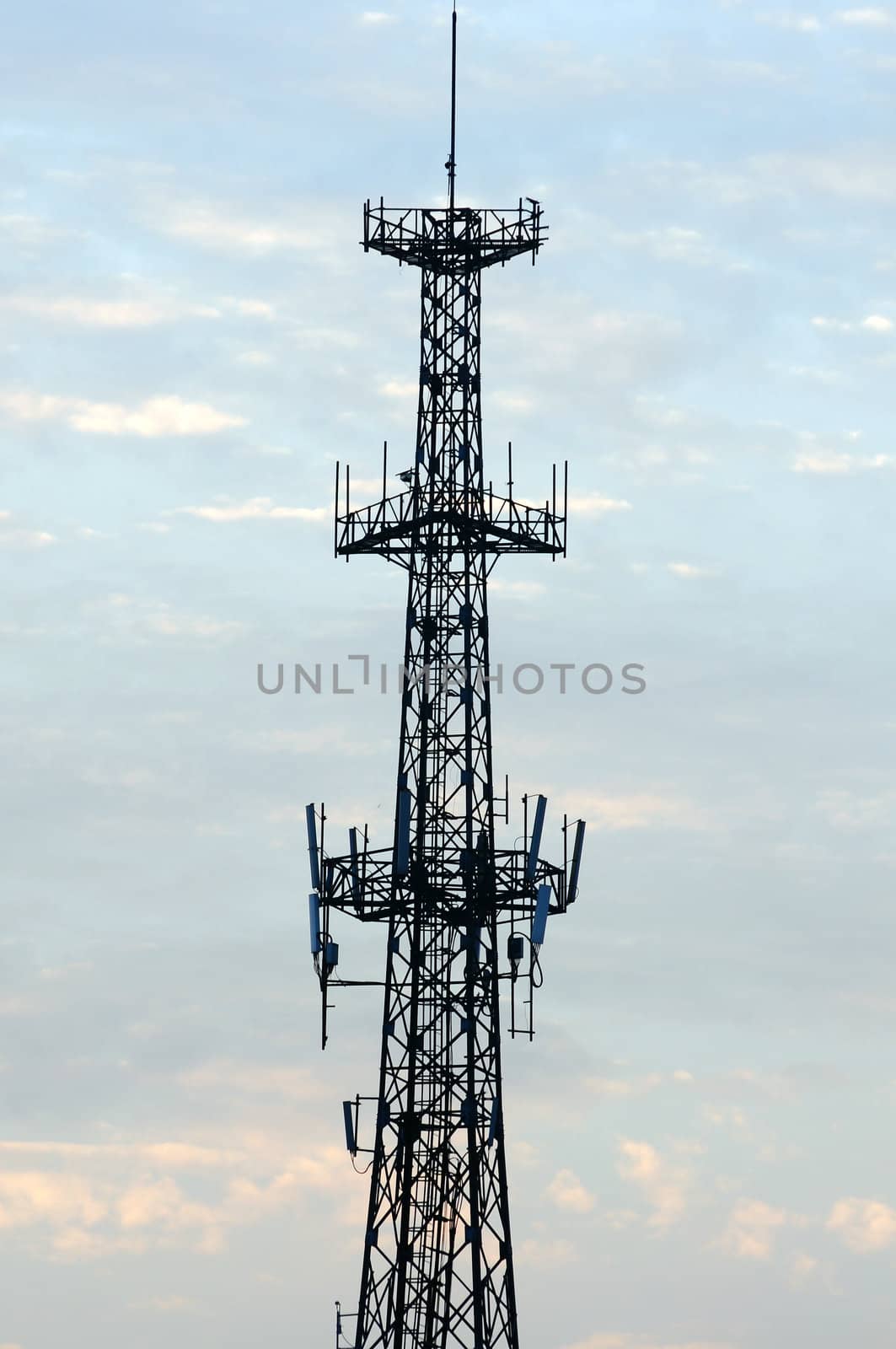 Antenna tower against blue sky