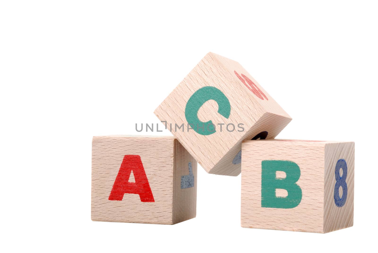The alphabet. Letters drawn on wooden cubes. A children's toy