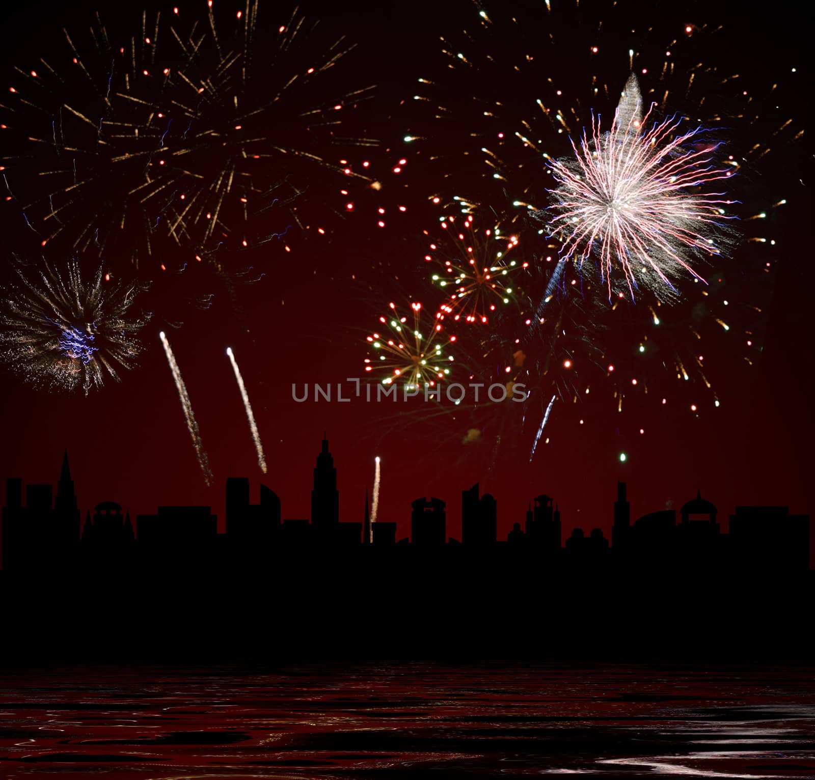 Fireworks over city. Celebratory salute. Bright fires on a black background