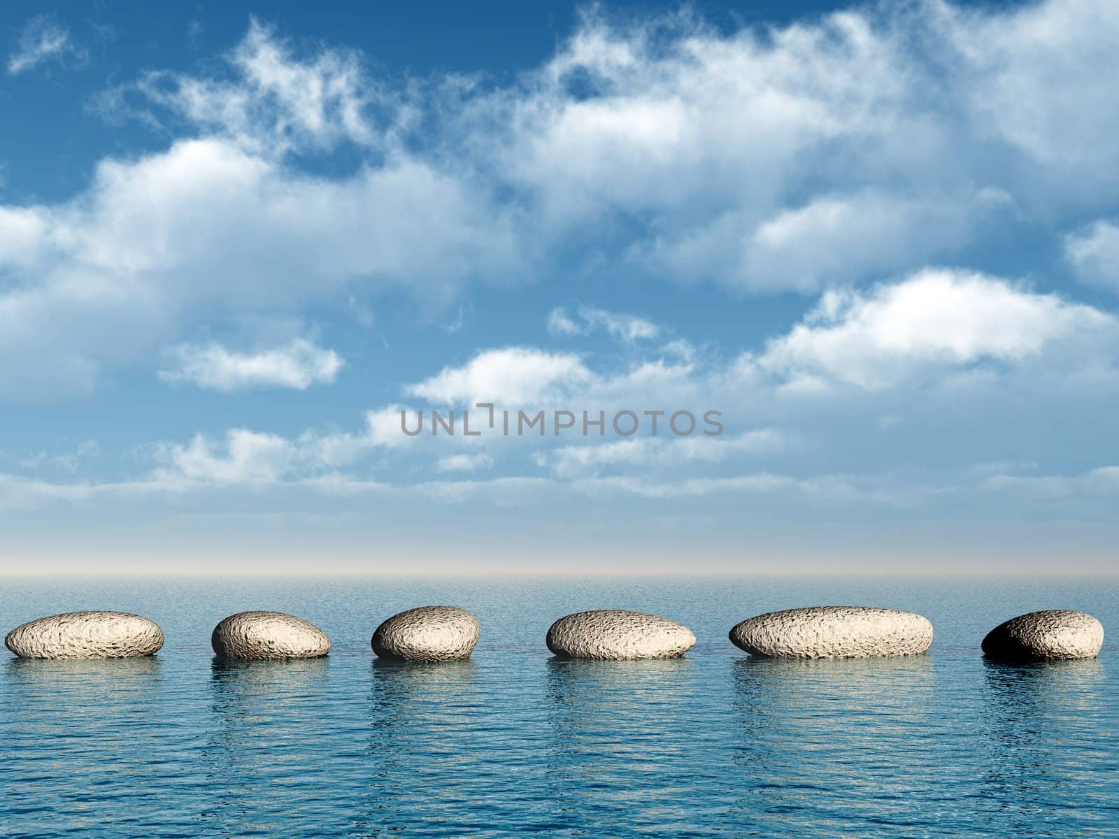 A row of stones in water. A pebble on a background of the sky