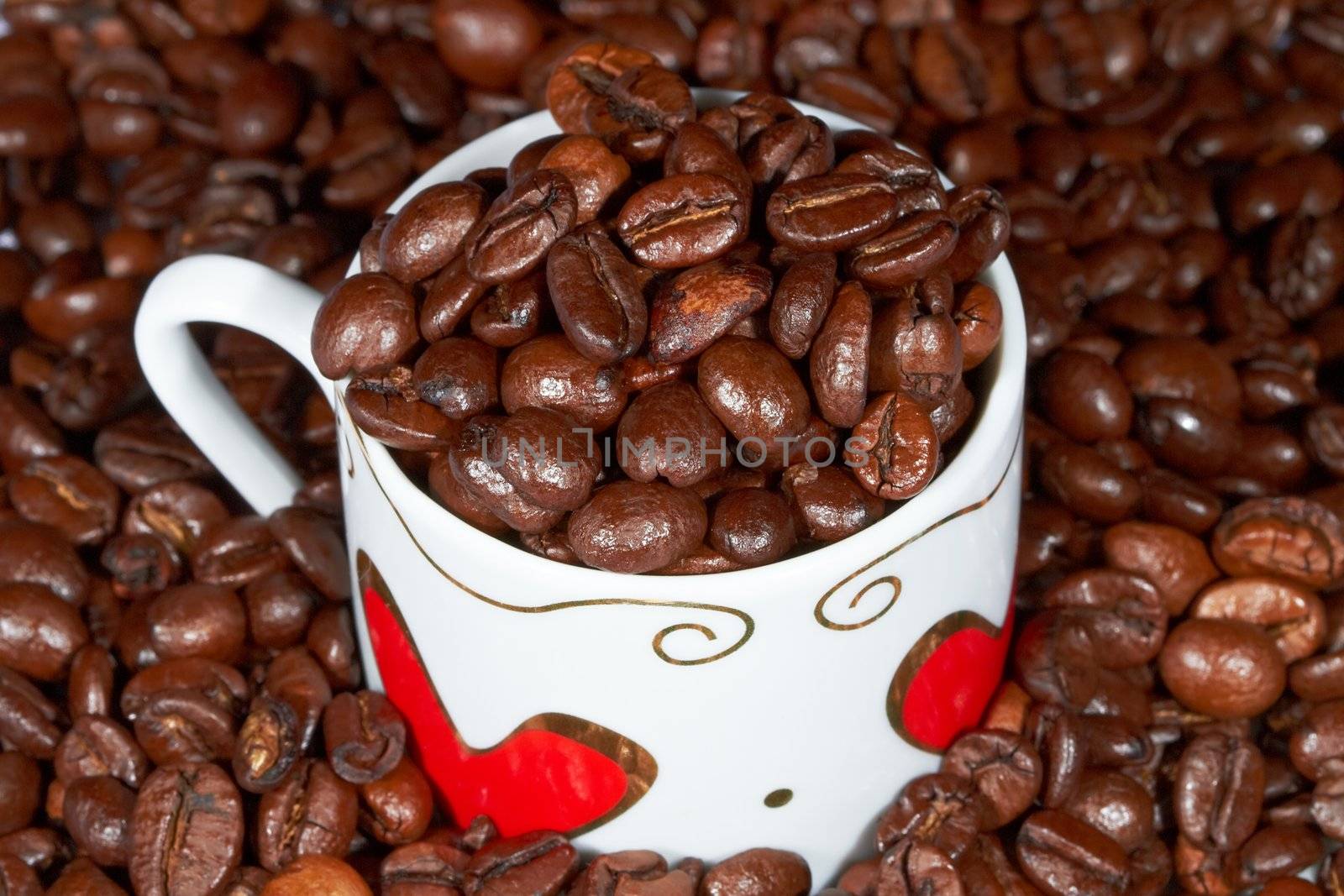 Cup with coffee beans. by tigrek