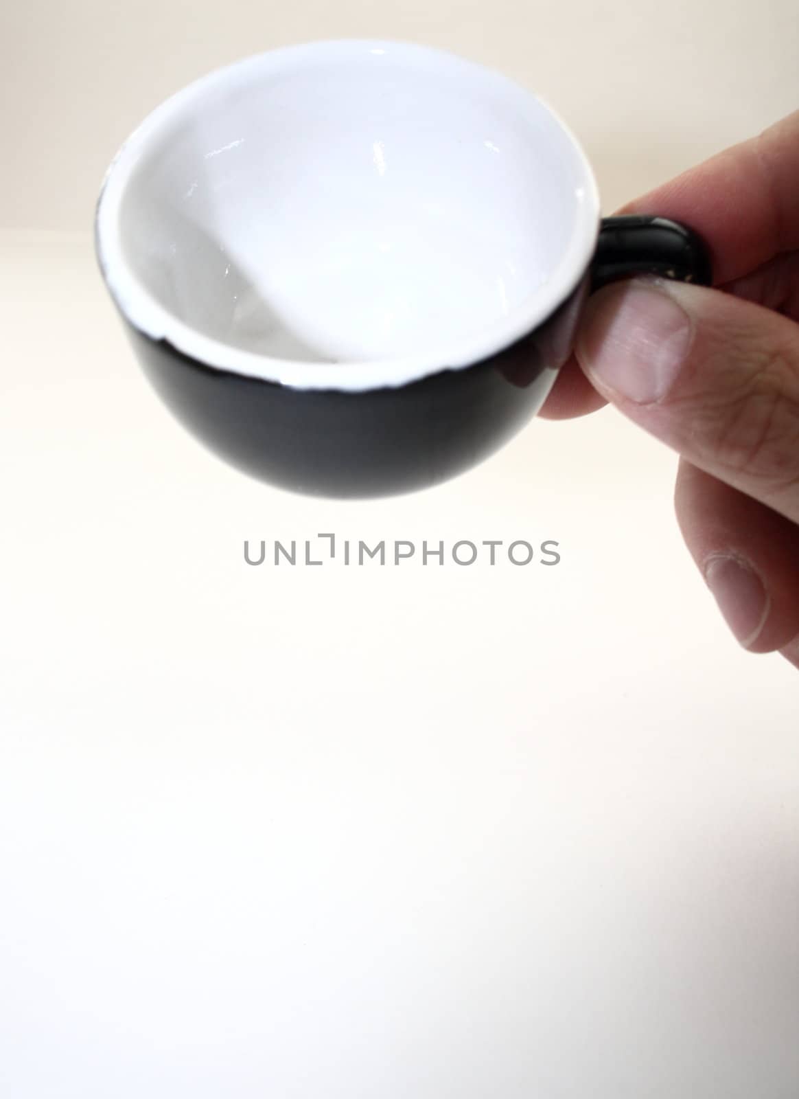 coffe cup tilted toward viewer by njene