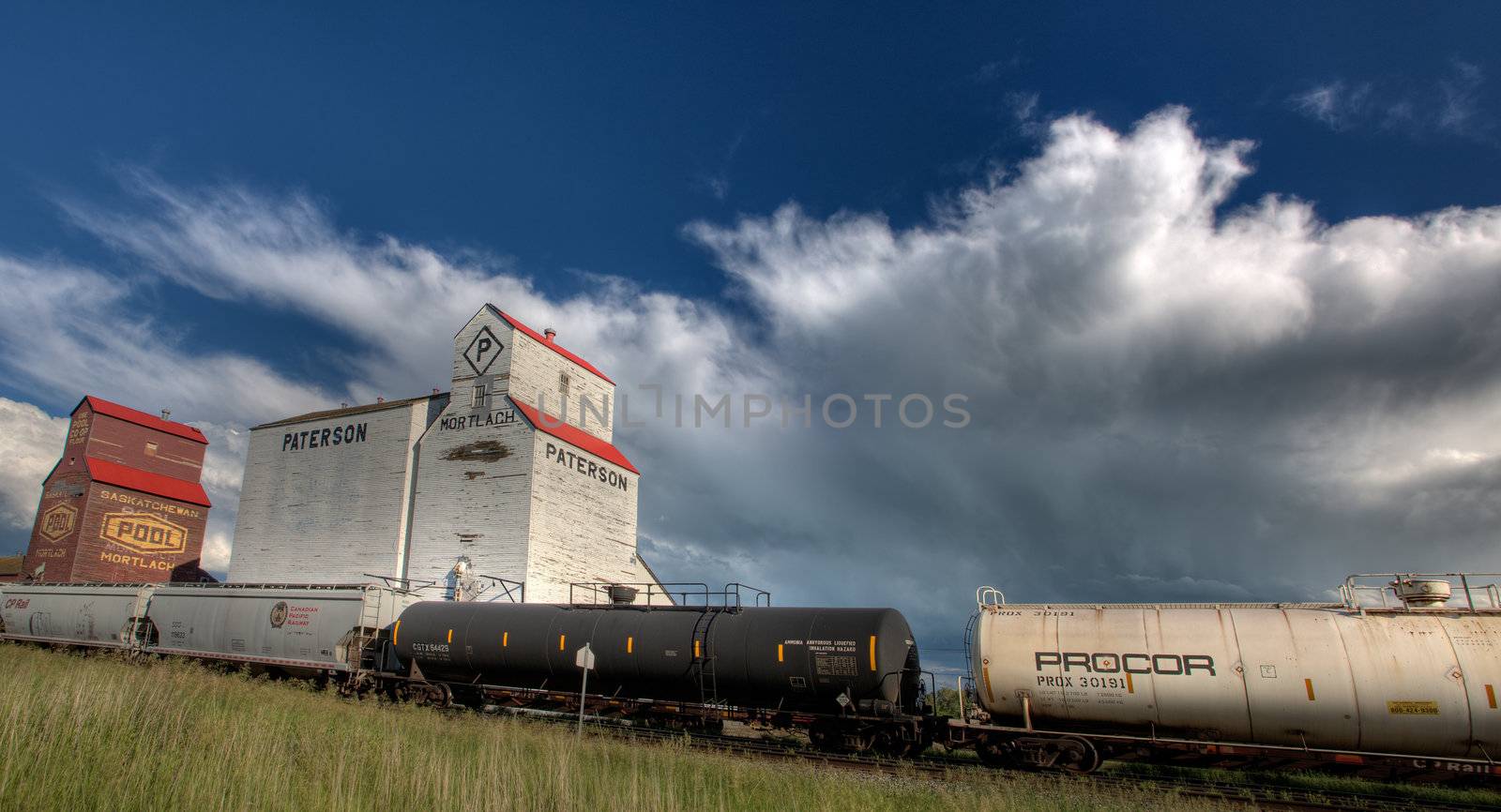 Storm Clouds over Grain Elevator by pictureguy