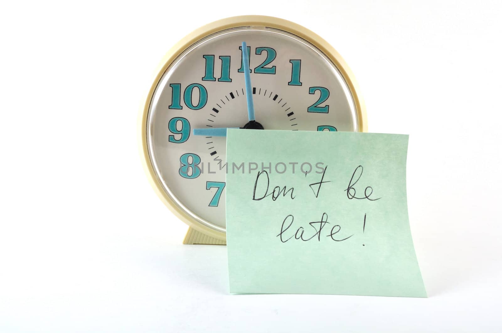 Clock with sticker Don`t be late. Business concept by lobzik