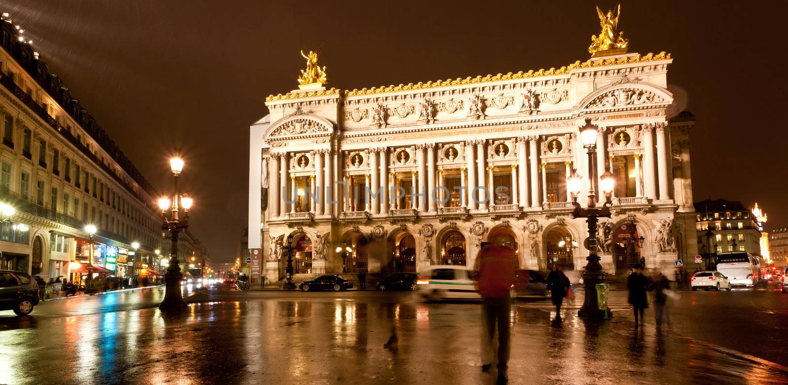 the famous grand Opera at a rainy night in Paris France