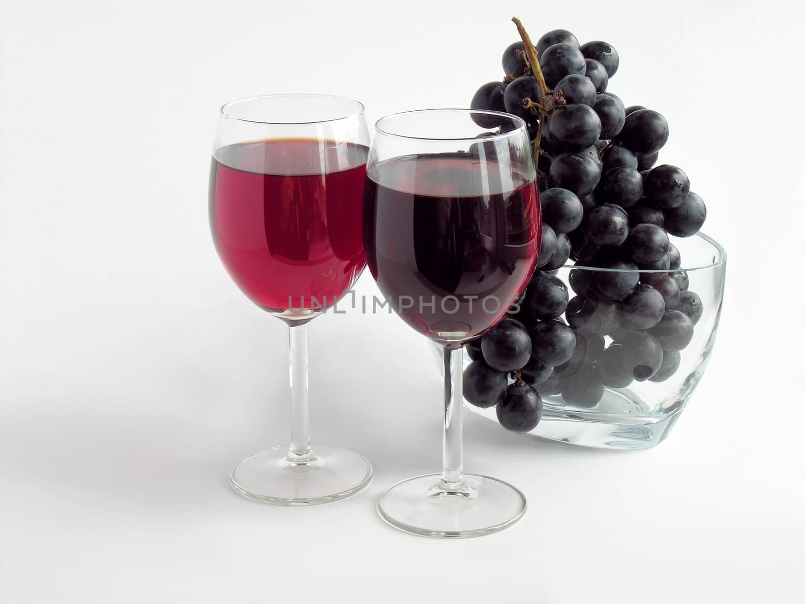 red wine and red grapes by RAIMA