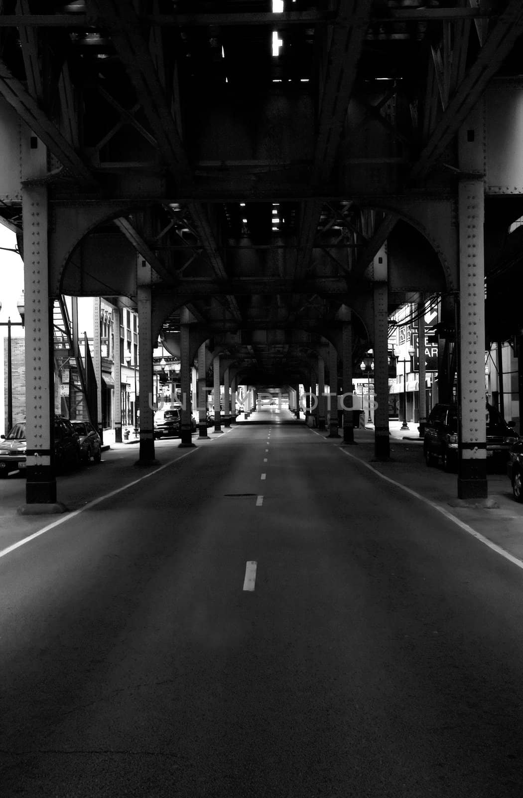 The Chicago street with the CTA train station above.