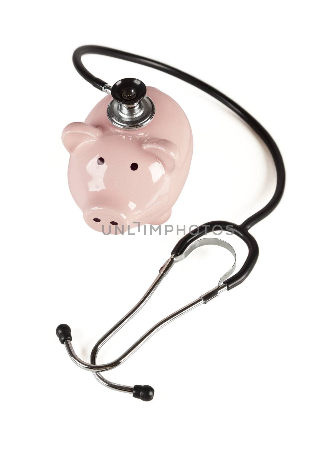 Piggy Bank and Stethoscope Isolated on a White Background.