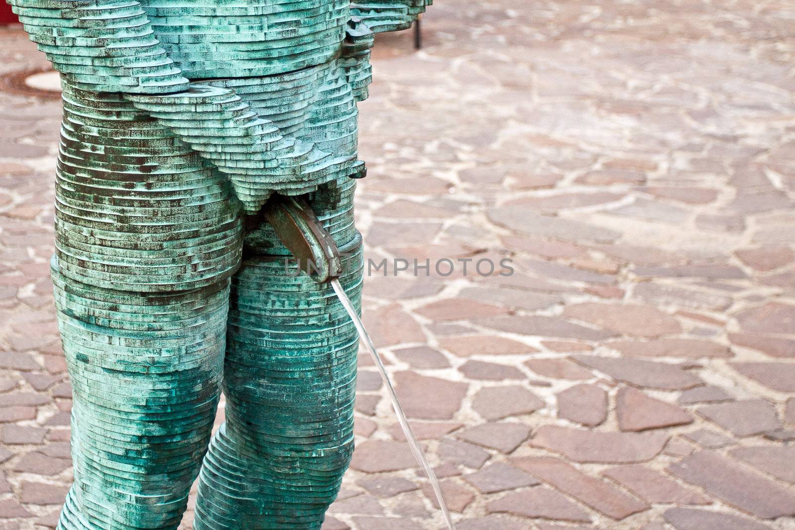 Fragment of the dountain with a pissing man in Prague