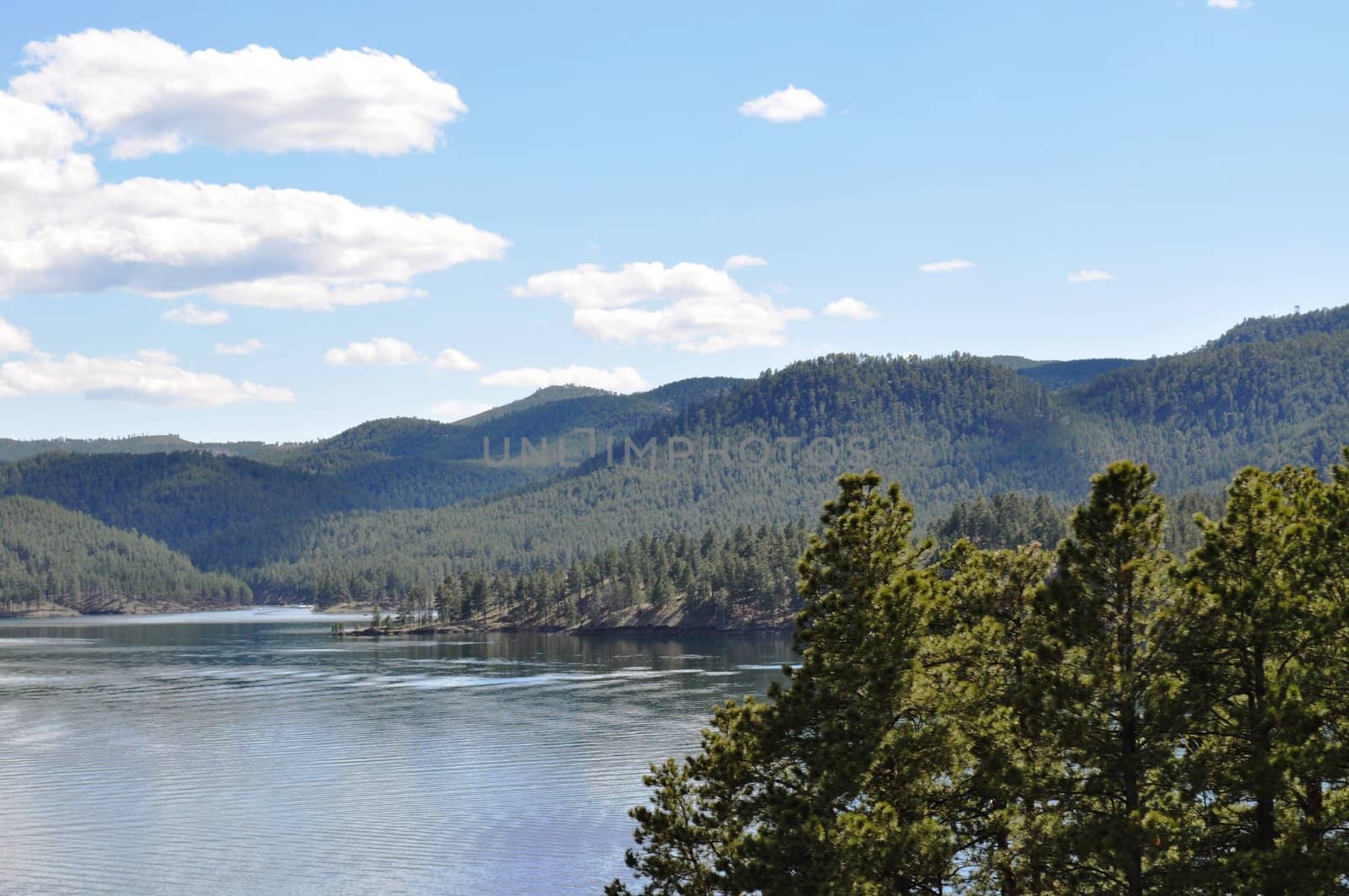 Black hills and water background by RefocusPhoto