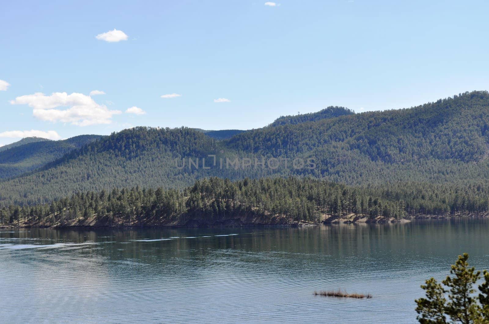 Black hills and water background by RefocusPhoto