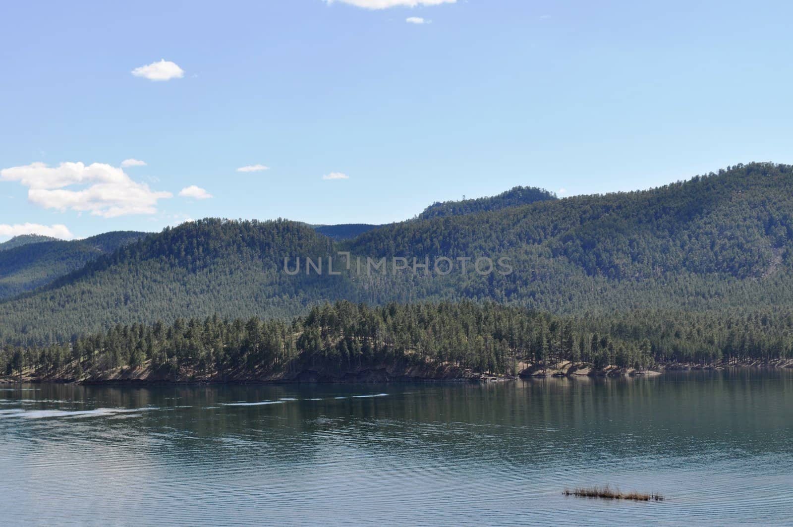 Black hills and water background