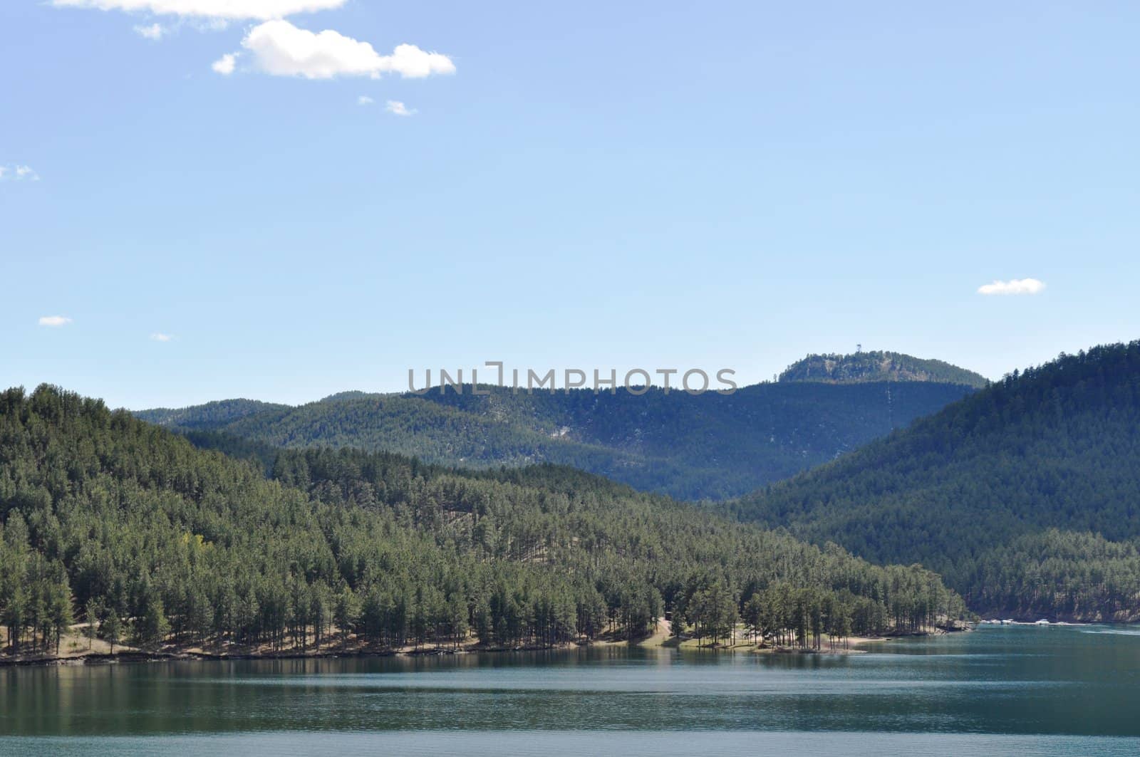 Black hills and water background