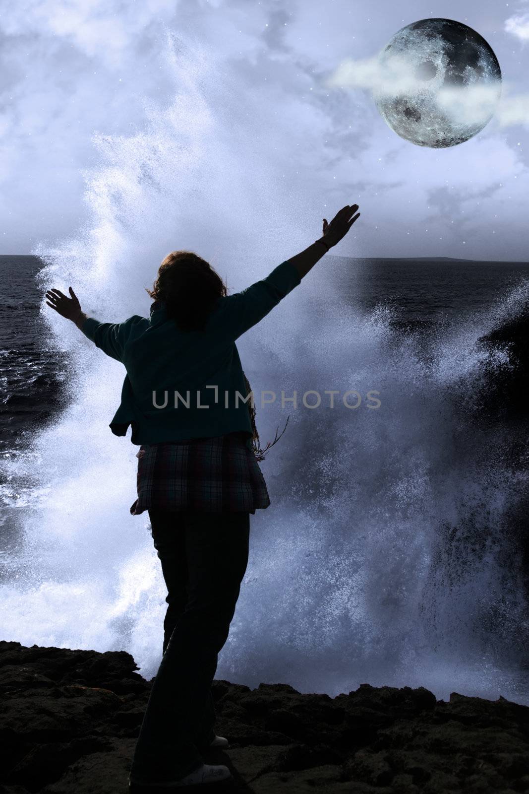 one woman with raised hands facing a wave and full moon on cliff by morrbyte