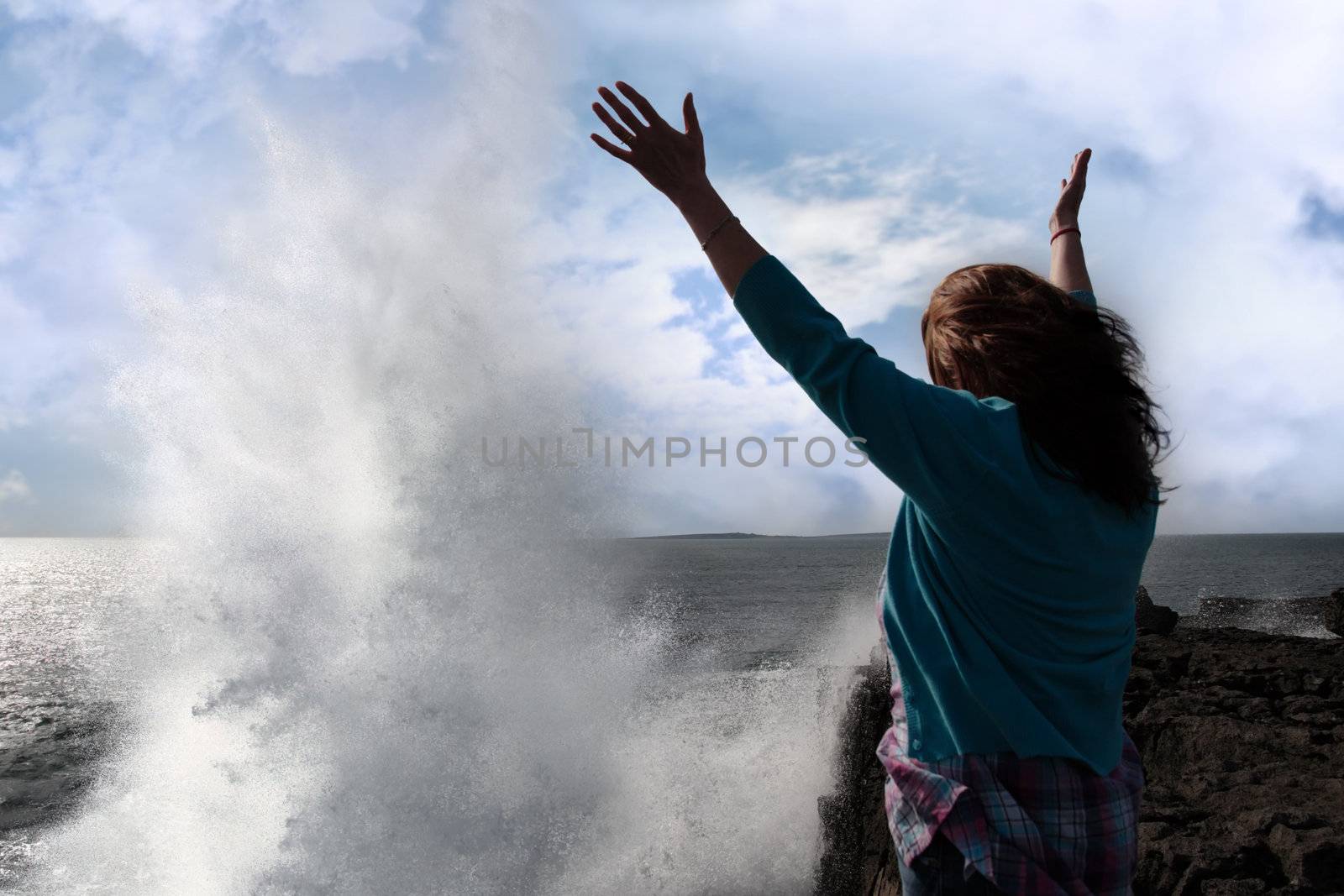 silhouette of lone woman facing a giant powerful wave by morrbyte