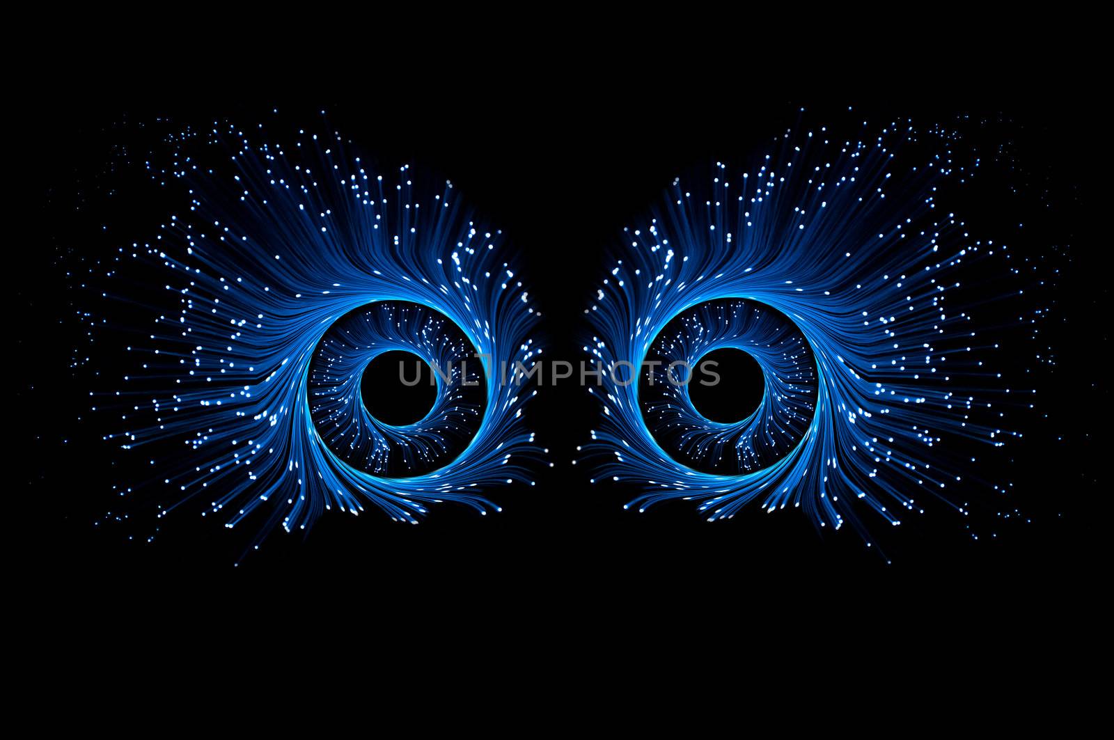Two blue eyes composed from illuminated fibre optic light strands against a black background.