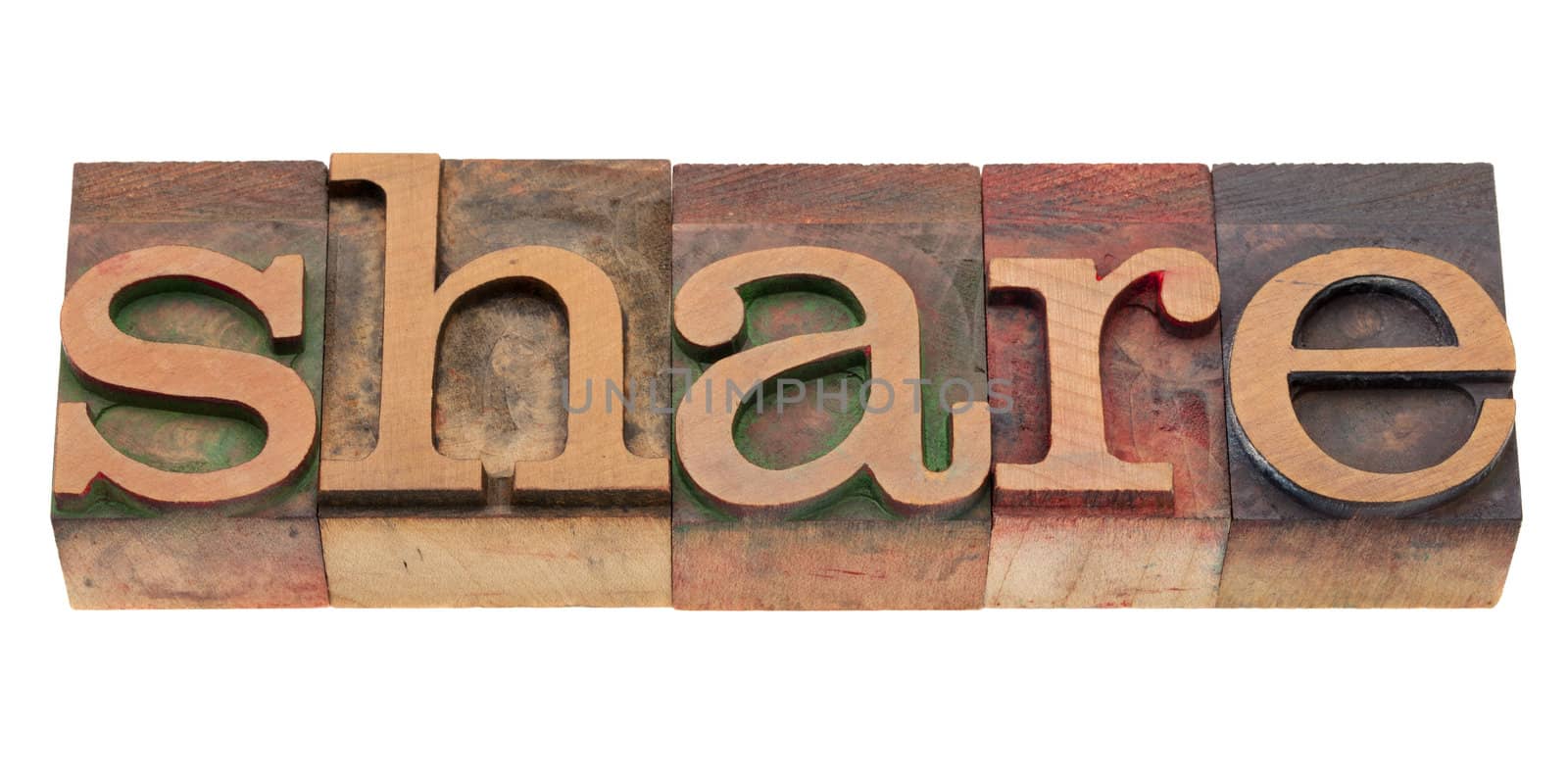 share word in vintage wood letterpress printing blocks, stained by color inks, isolated on white