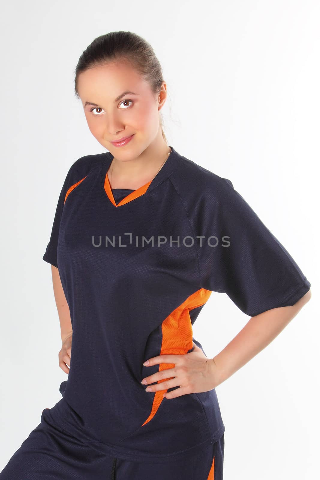 The young and beautiful girl in the football form