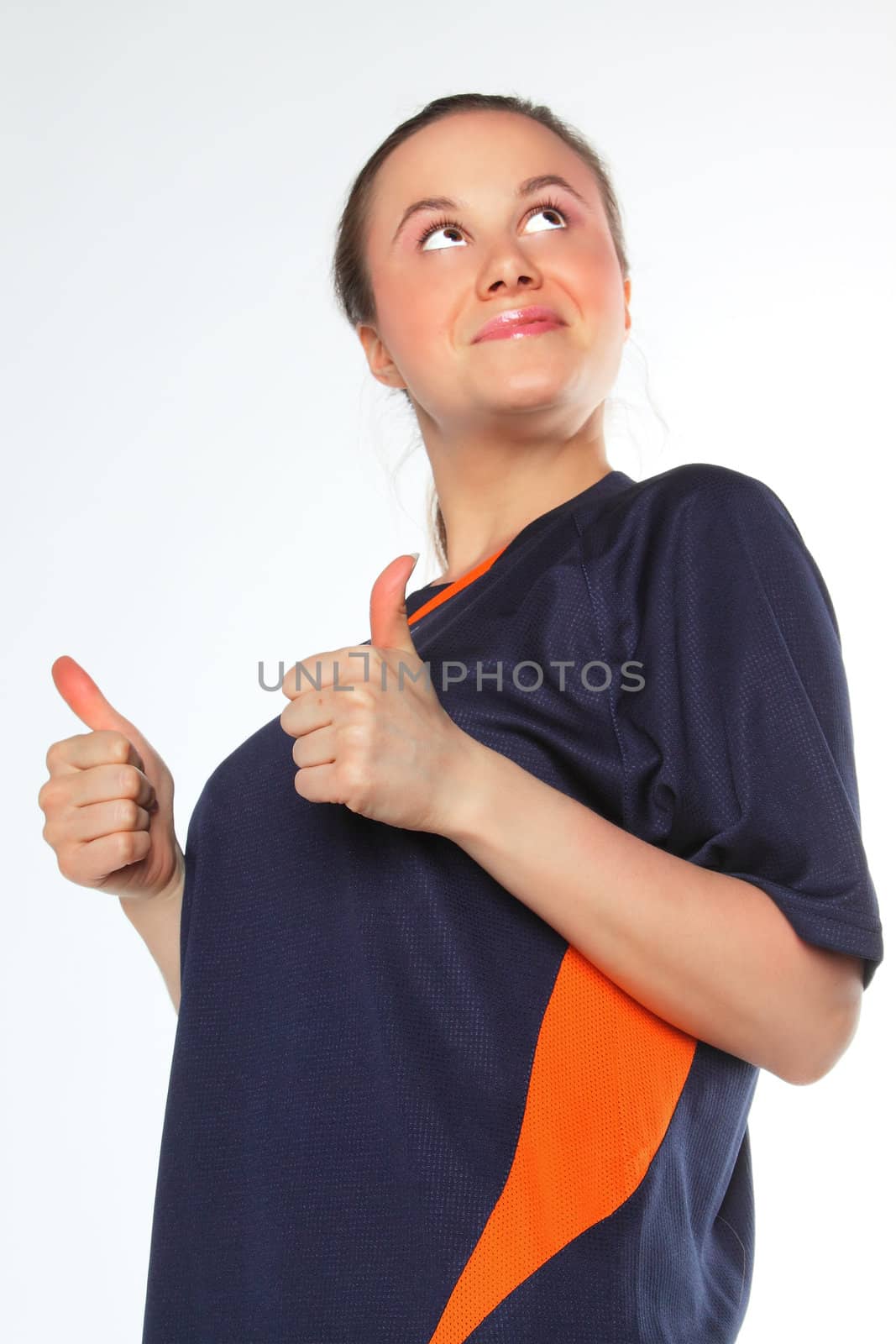 The young and beautiful girl in the football form