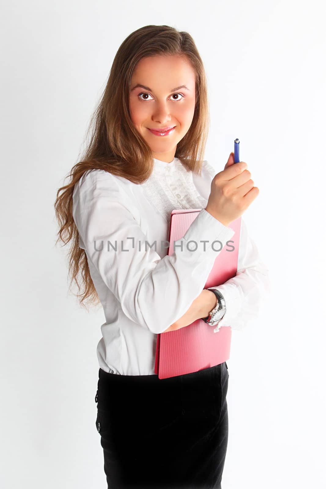 The young and beautiful girl in office clothes
