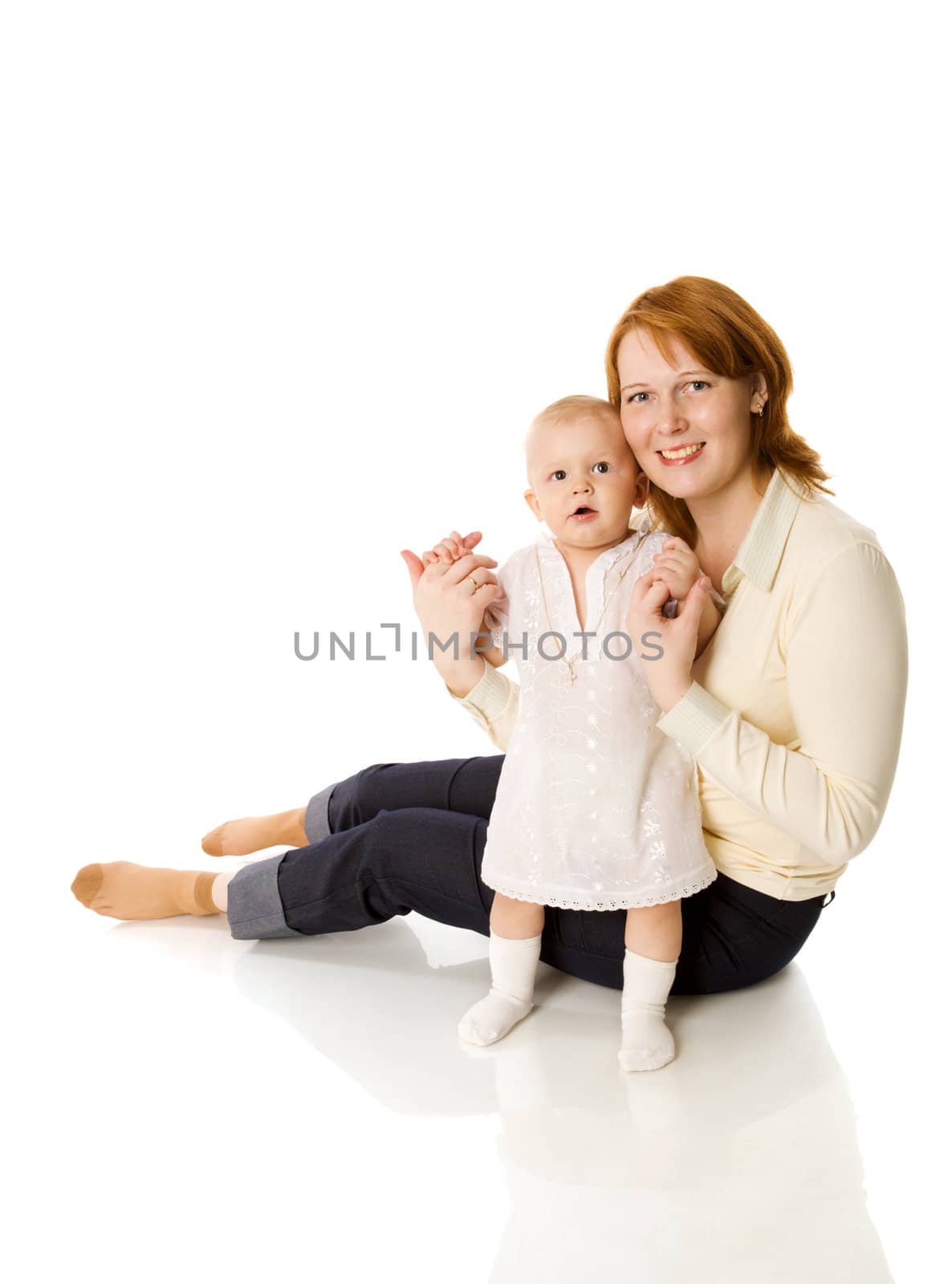 Happy mother holding daughter isolated on white