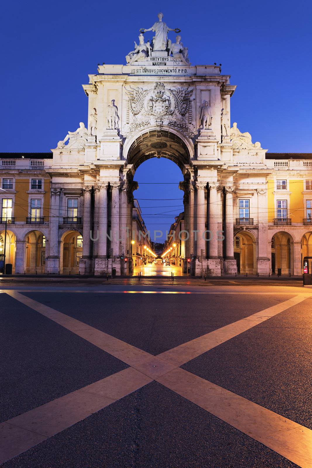 Stone arch at commerce square at Lisbon by night