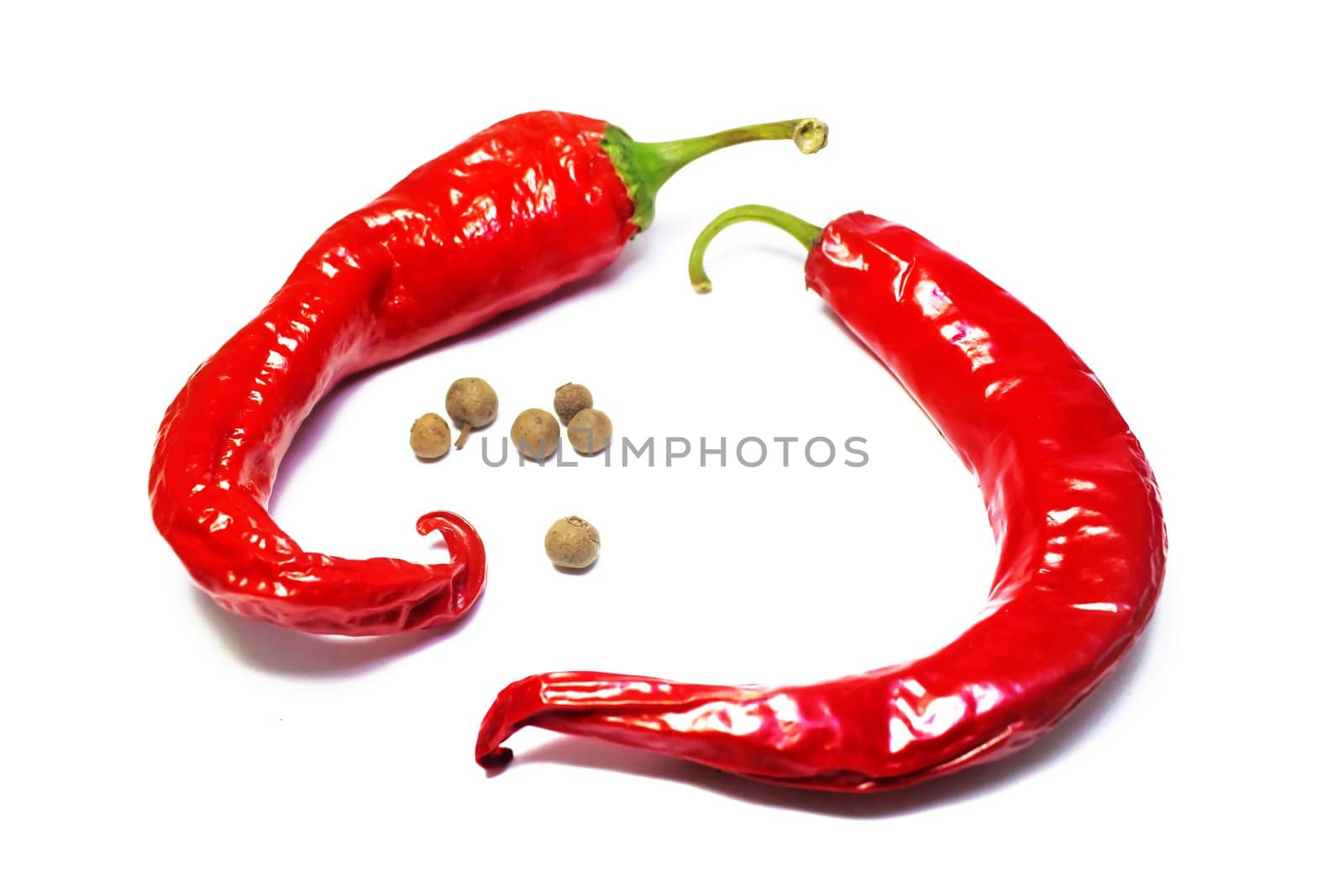 Red hot chili peppers on white background