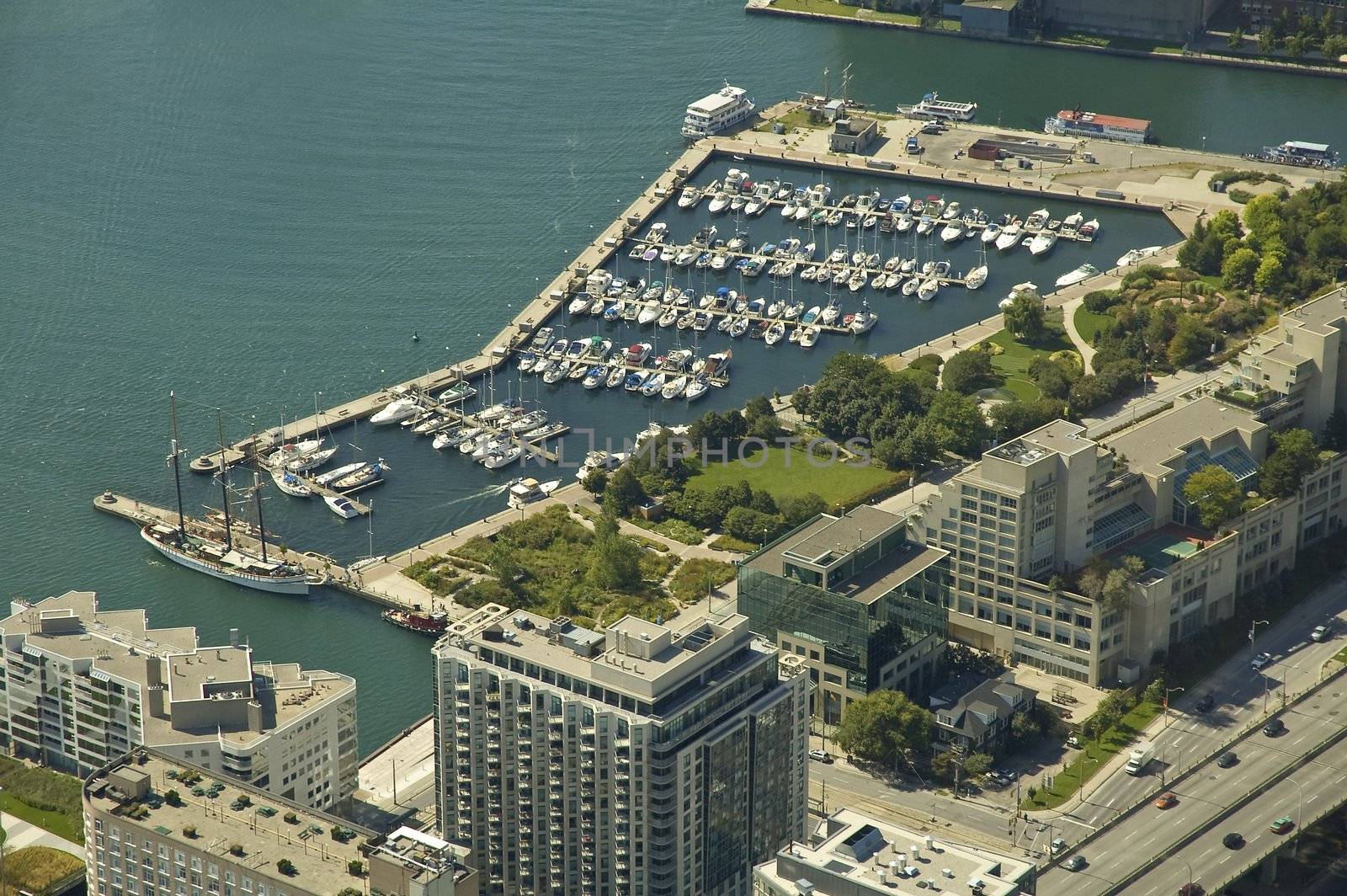Toronto port aerial view, several small and one big yacht