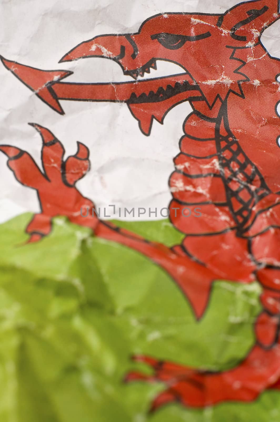 wrinkled paper Flag of Wales detail photo