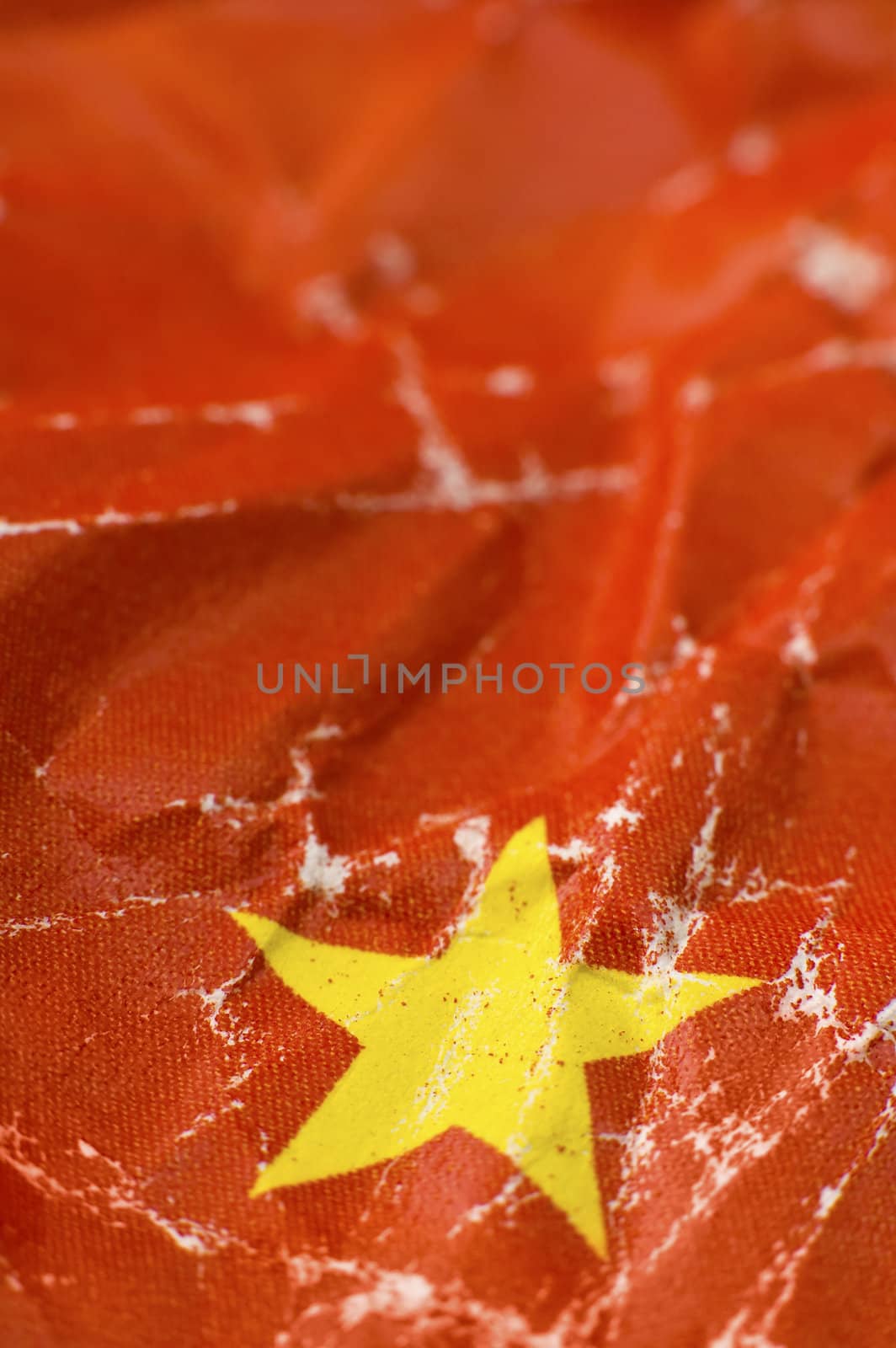 communism background, it is actually a small part of chinese flag, with yellow star in focus